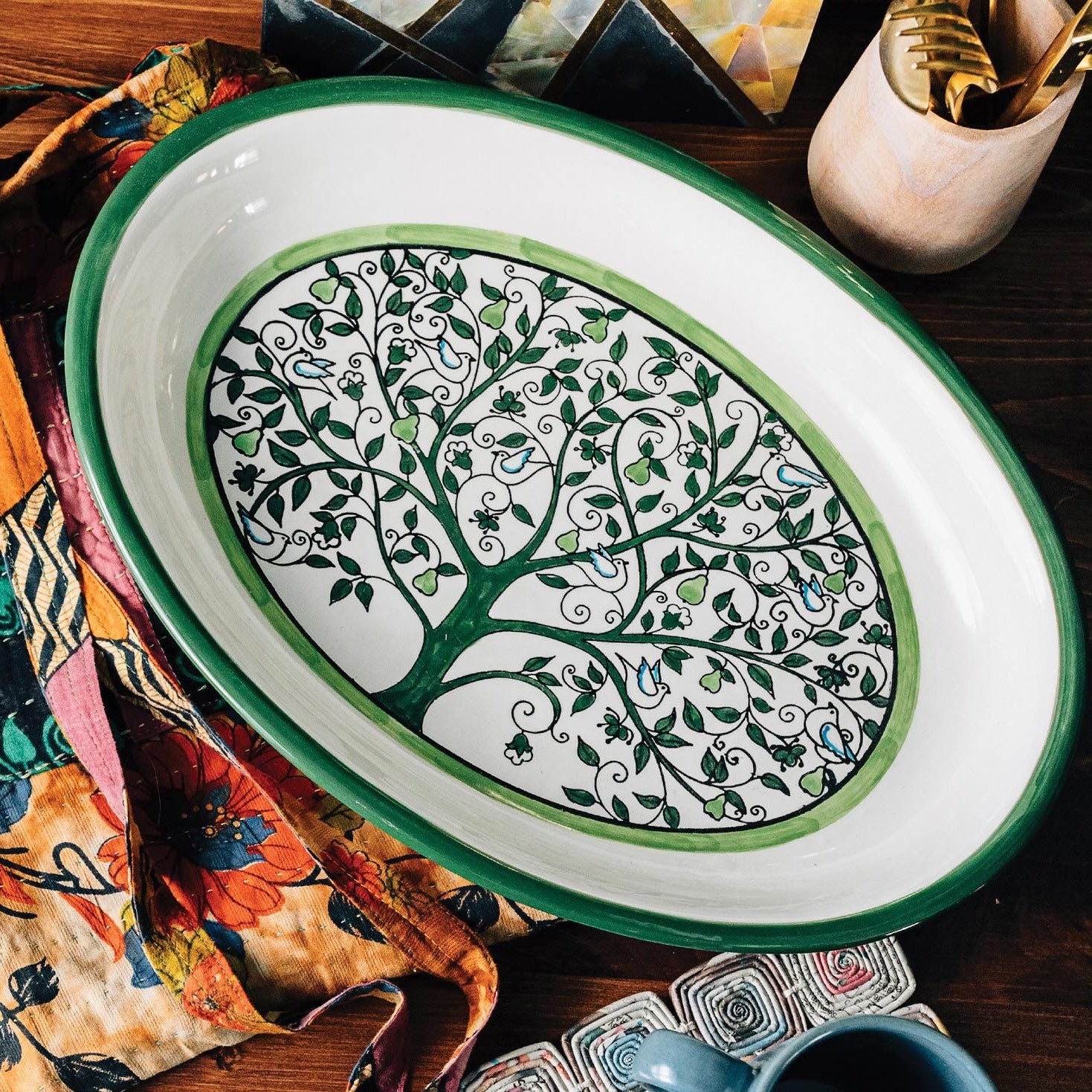 Artisan Tree of Life Serving Platter from a side angle, perfect for displaying appetizers.