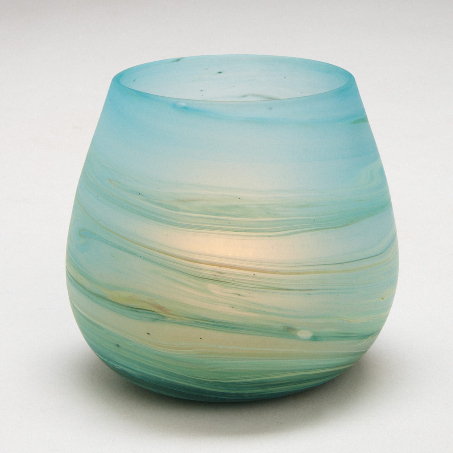 Artisan Hebron glass candle holder with colorful swirls for decorative use