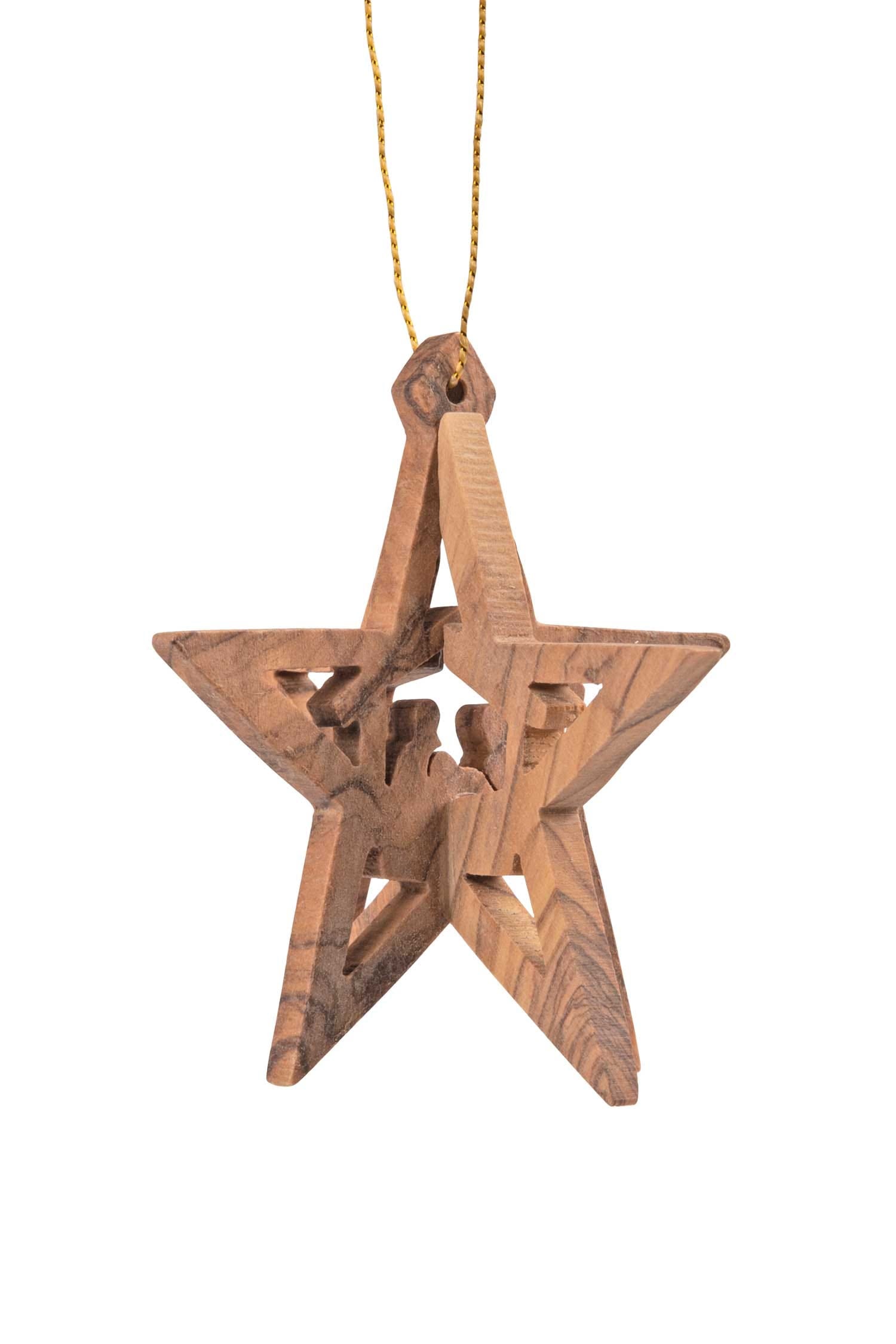 Close-up of handcrafted olive wood nativity ornament showing detailed carving