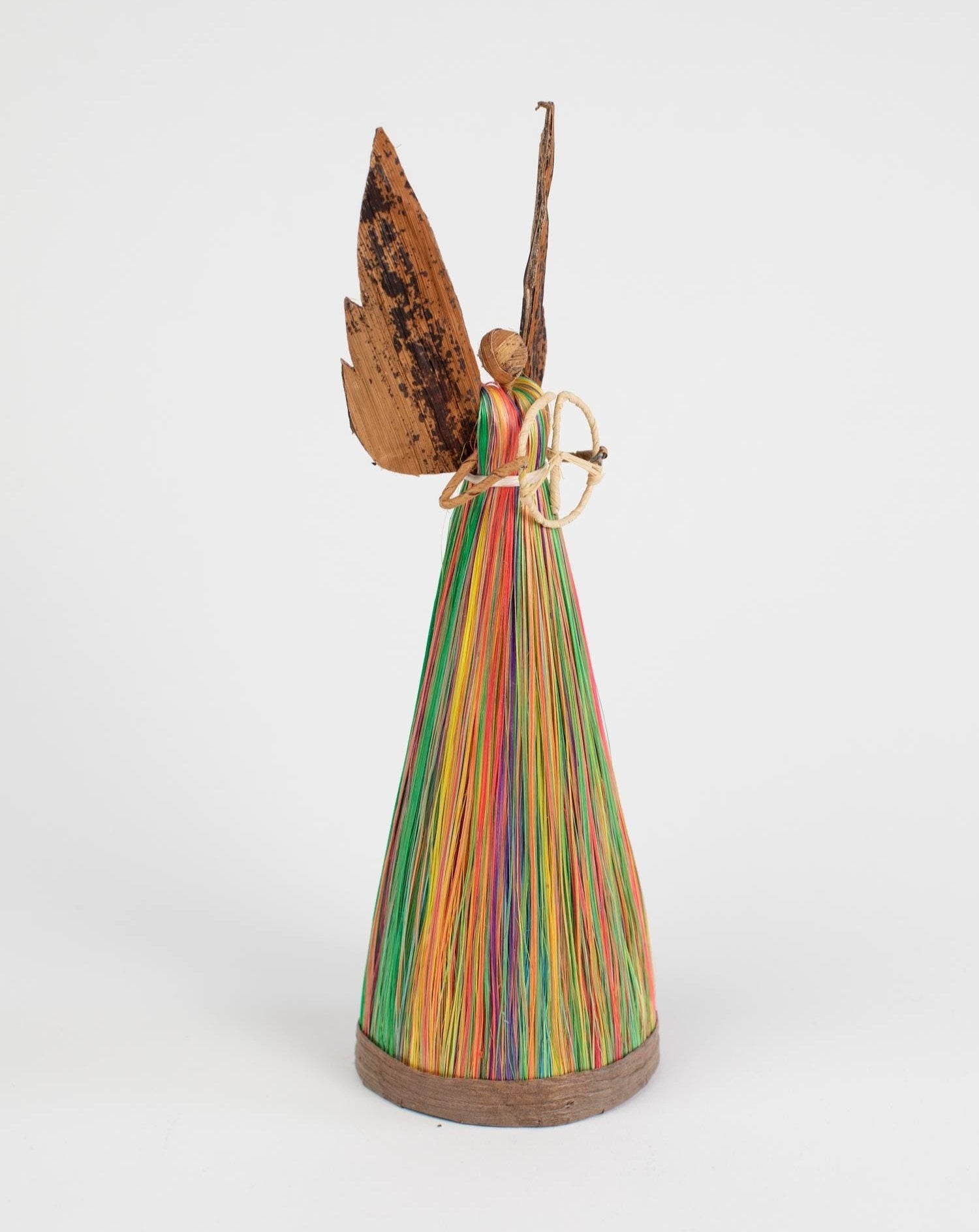 Heavenly Artisan Angel Tree Topper showcasing intricate design and natural fiber craftsmanship.