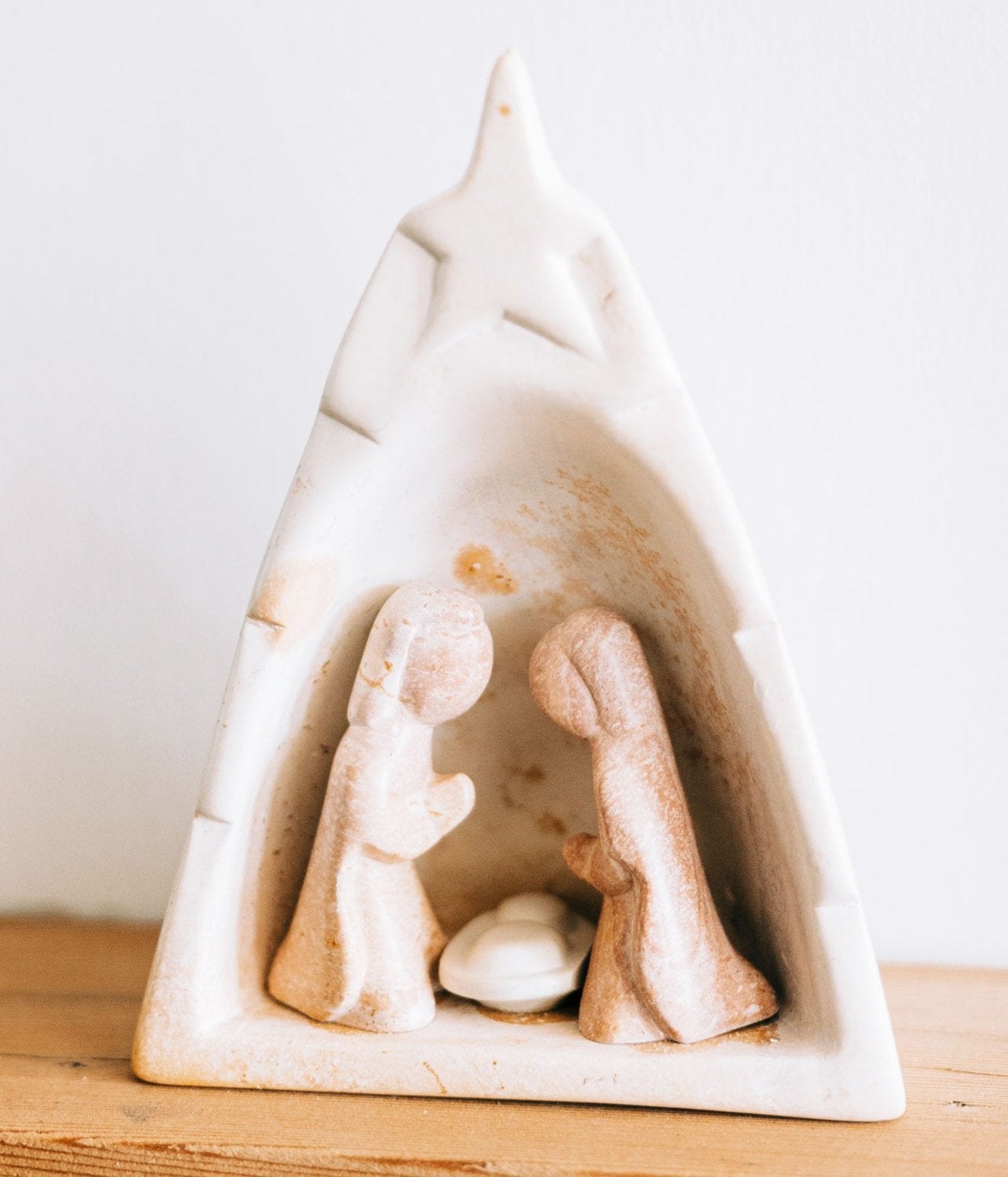 Close-up of the hand-carved Kisii stone nativity figures showing detailed craftsmanship