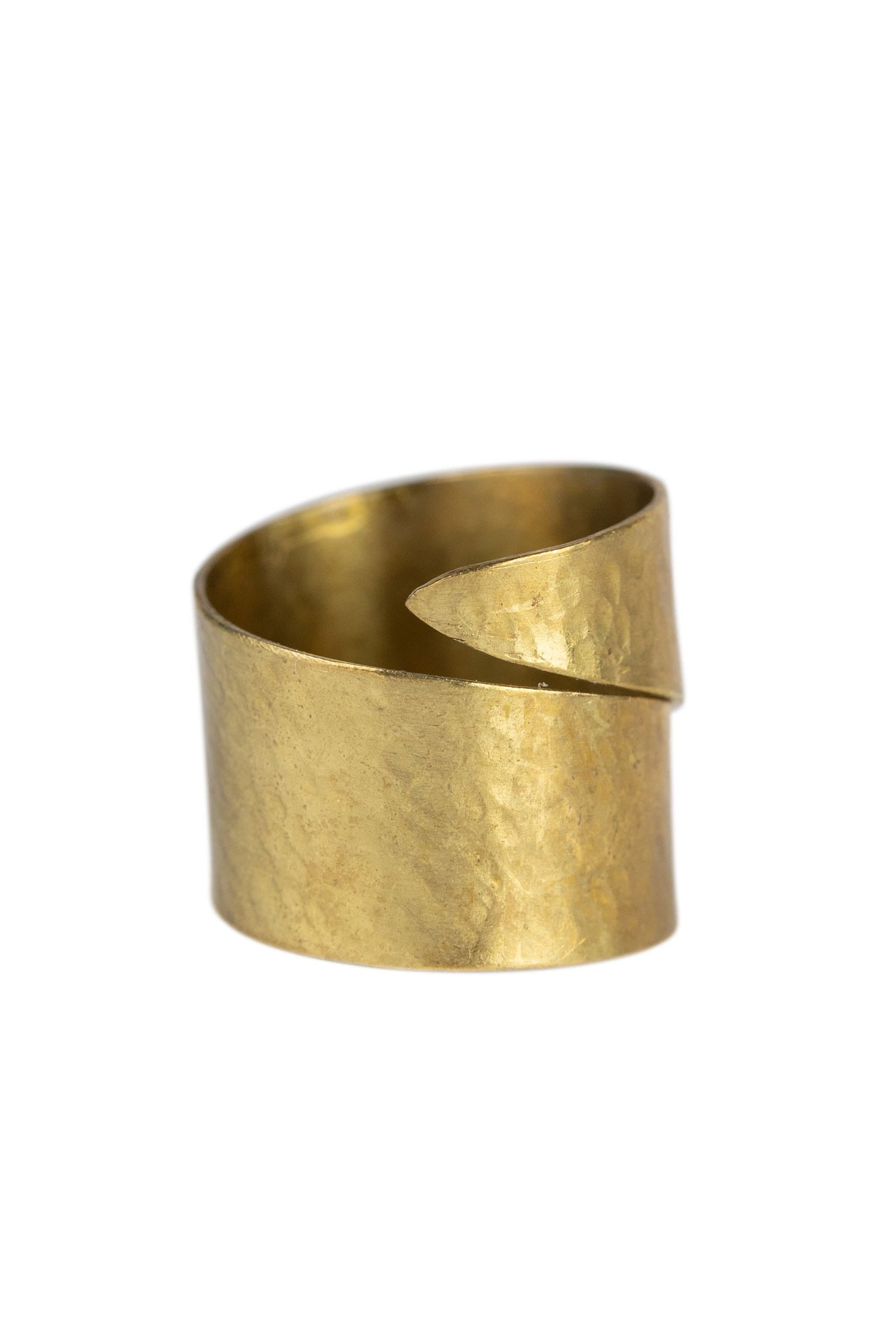 Close-up view of the artisan adjustable hammered wrap ring on a model's finger, highlighting its unique design.