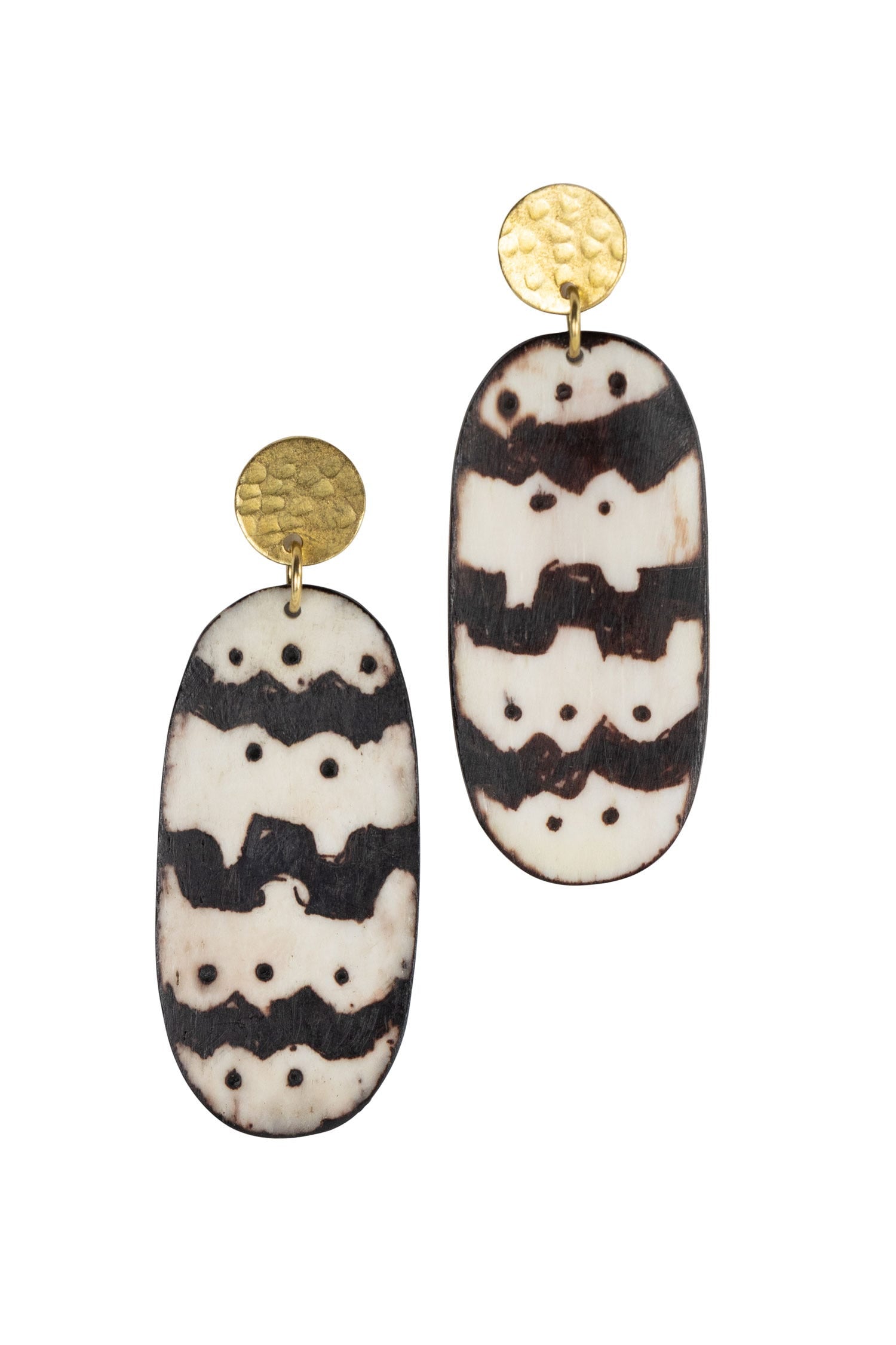 Close-up of handmade geometric earrings showcasing intricate design