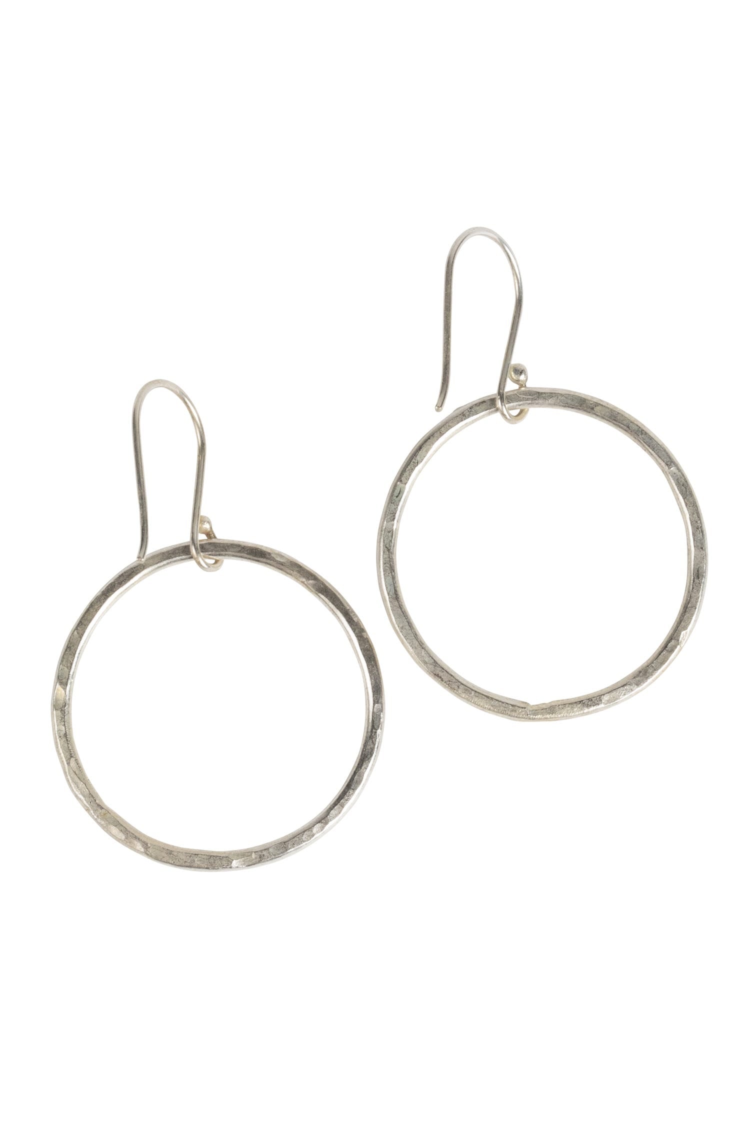 Close-up of the Artisan Hammered Silver Ring Earrings showcasing the unique texture and design.