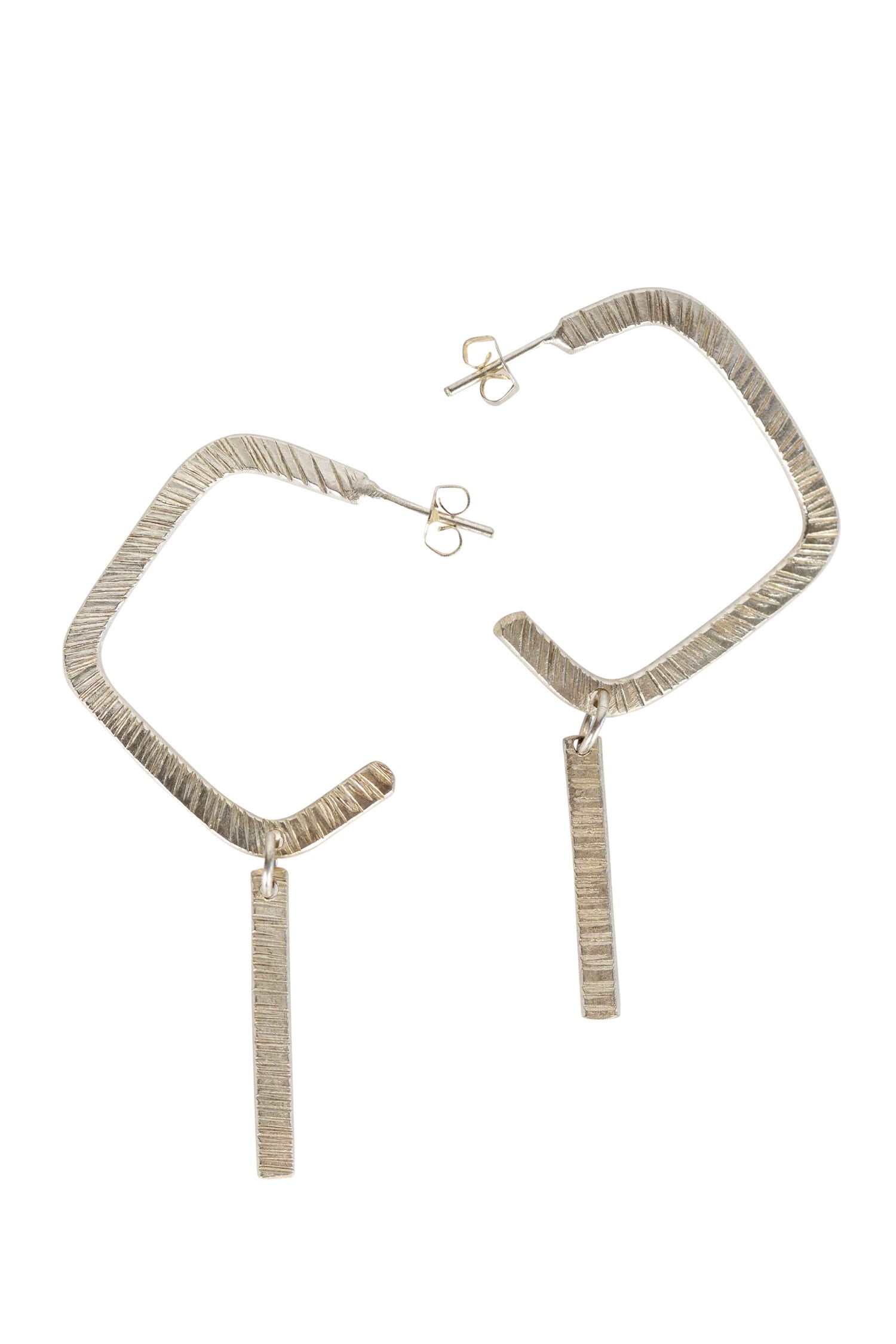 Front view of handcrafted silver square hoop earrings with geometric design