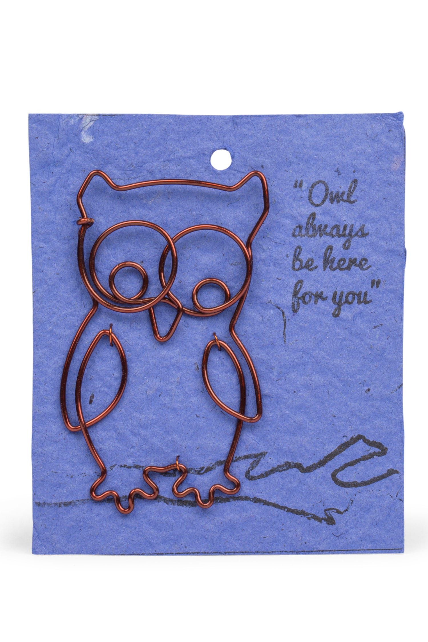 Close-up of artisan made owl bookmark crafted from copper wire