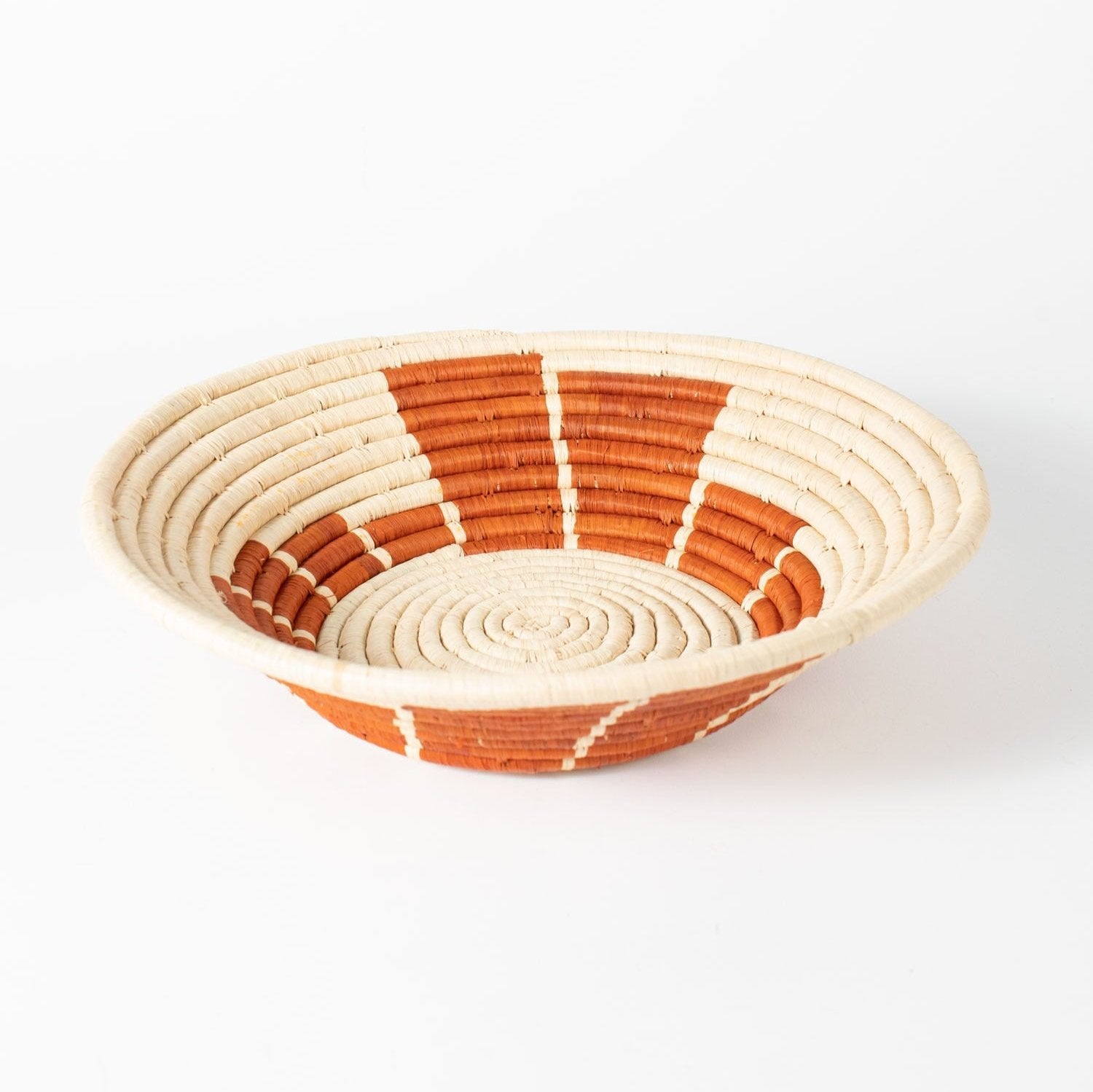 Close-up of the handwoven Shine Basket showcasing traditional Ugandan craftsmanship