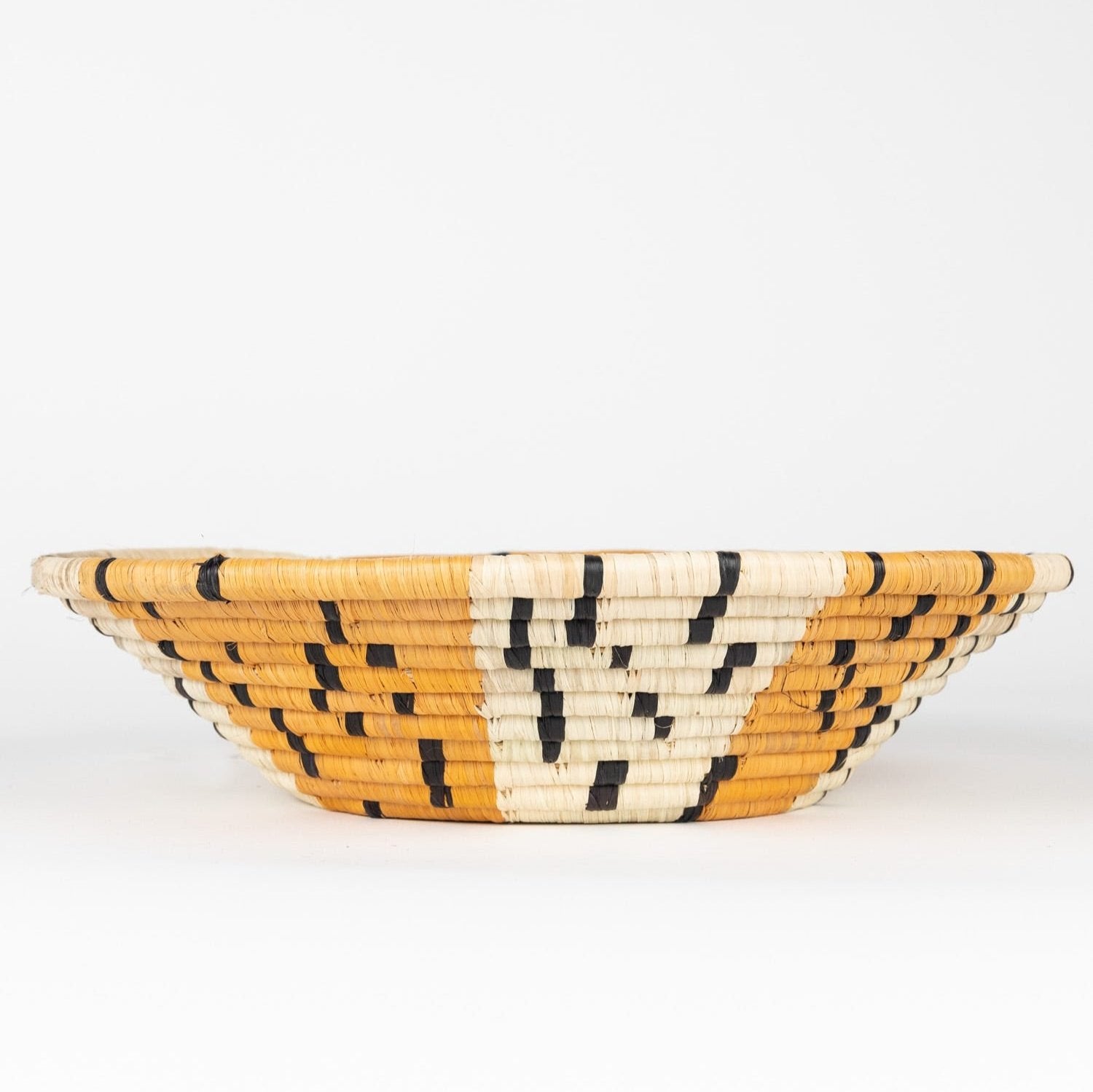 Close-up of handwoven Raffia Dash Table Basket showing detailed craftsmanship