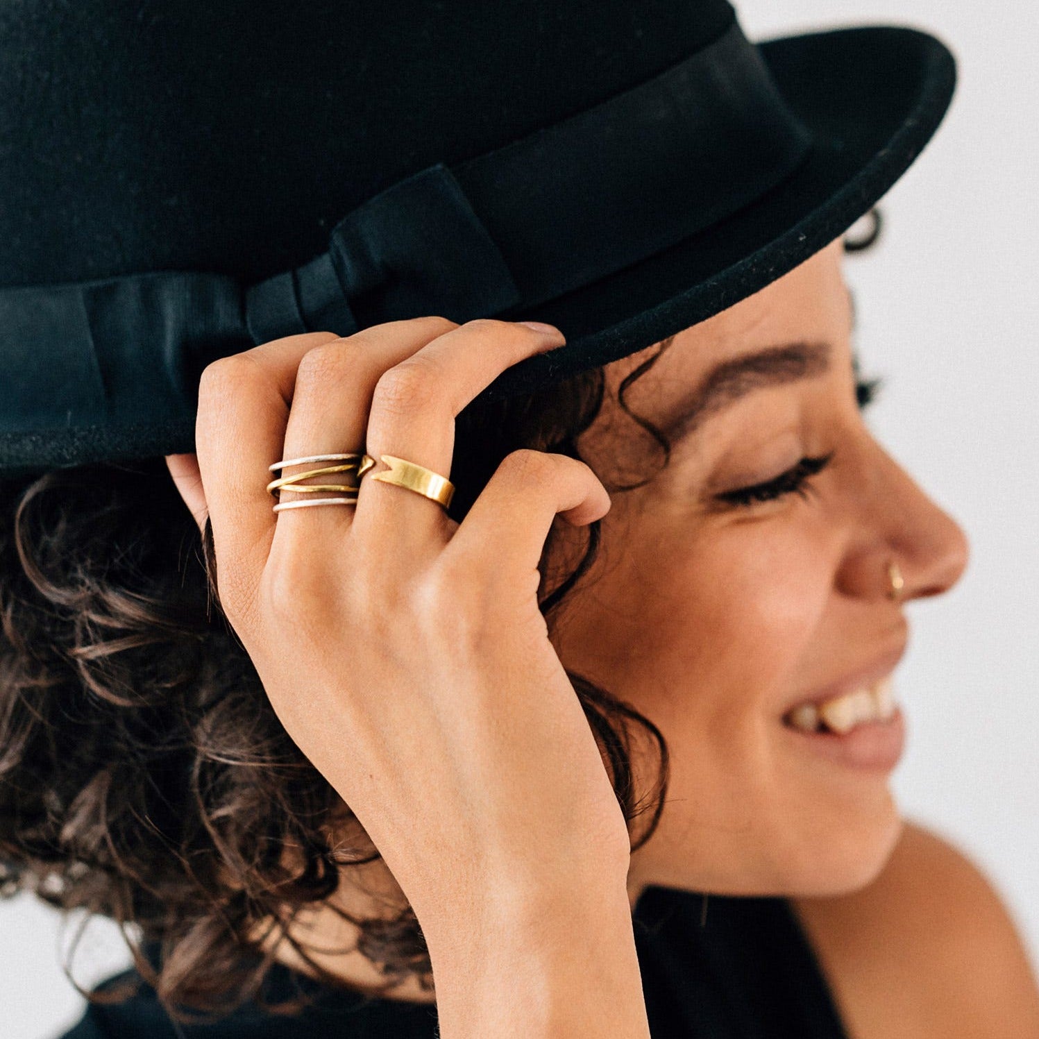 Side view of the adjustable Pathways to Peace Ring, highlighting its intricate craftsmanship.