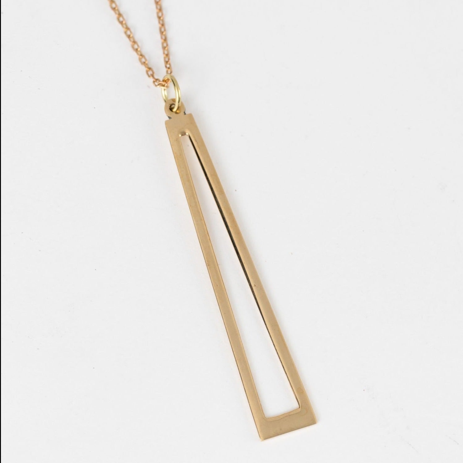 Close-up of handcrafted pendant necklace with intricate artisan details