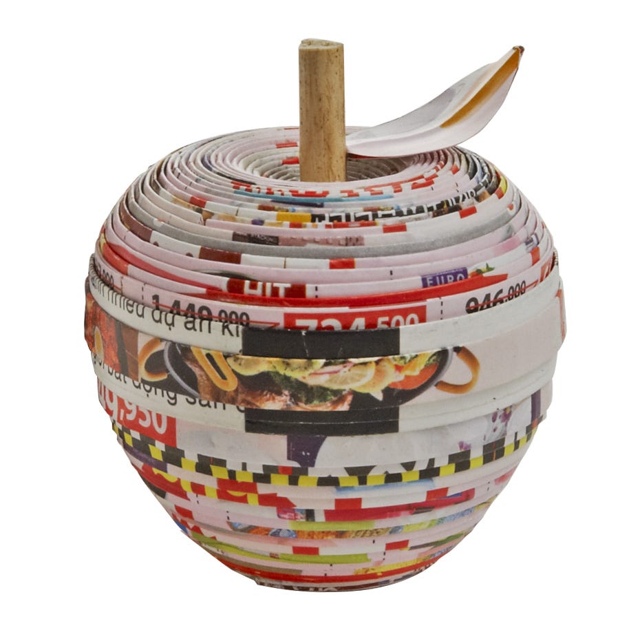 Close-up of the handcrafted recycled paper apple box highlighting its intricate detail