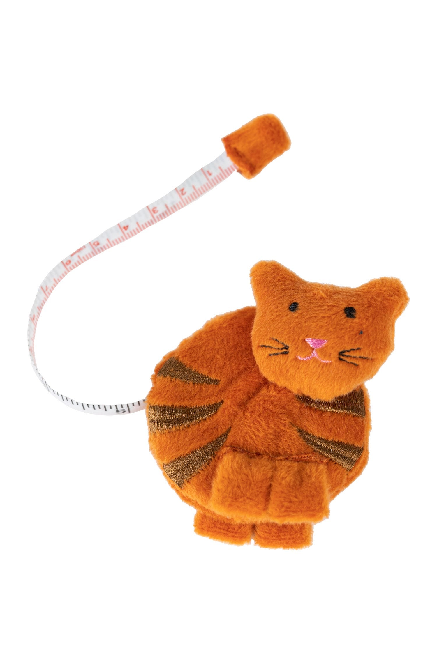 Close-up of the charming cat-themed measuring tape, showcasing the playful design.
