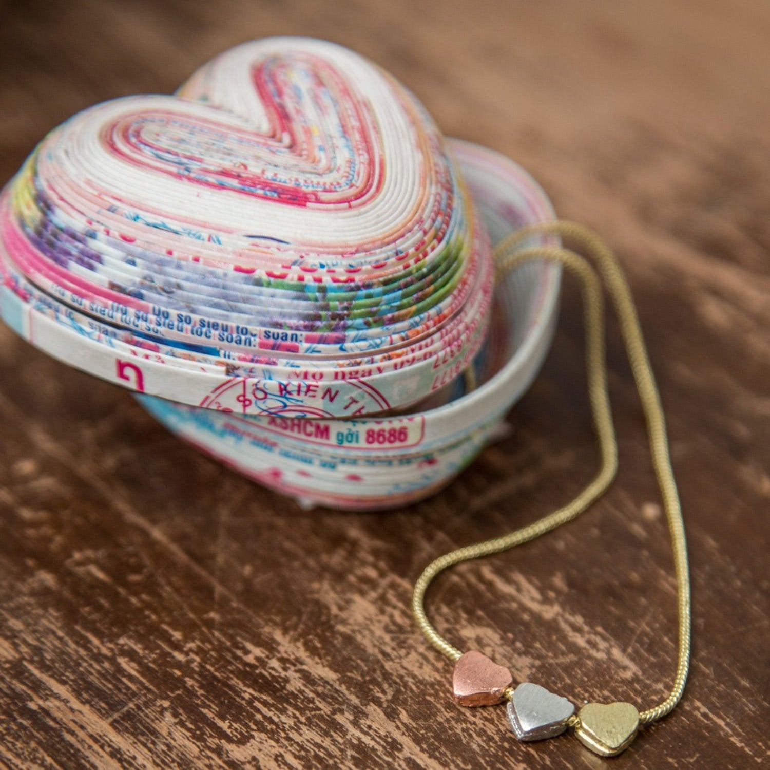 Close-up of handmade recycled paper bowl showing detailed craftsmanship