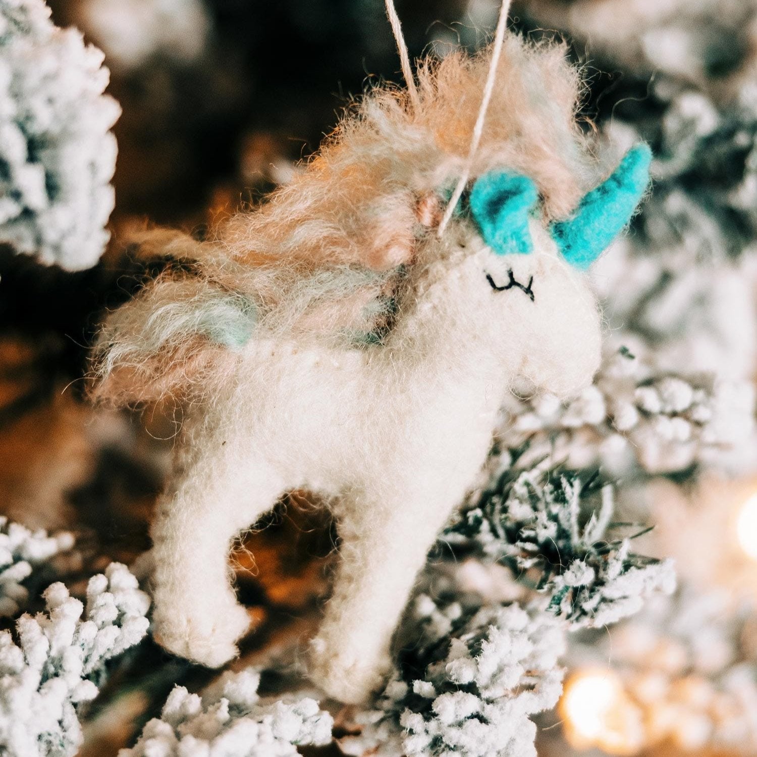 Magical unicorn ornament showcasing vibrant colors, perfect for holiday decor.