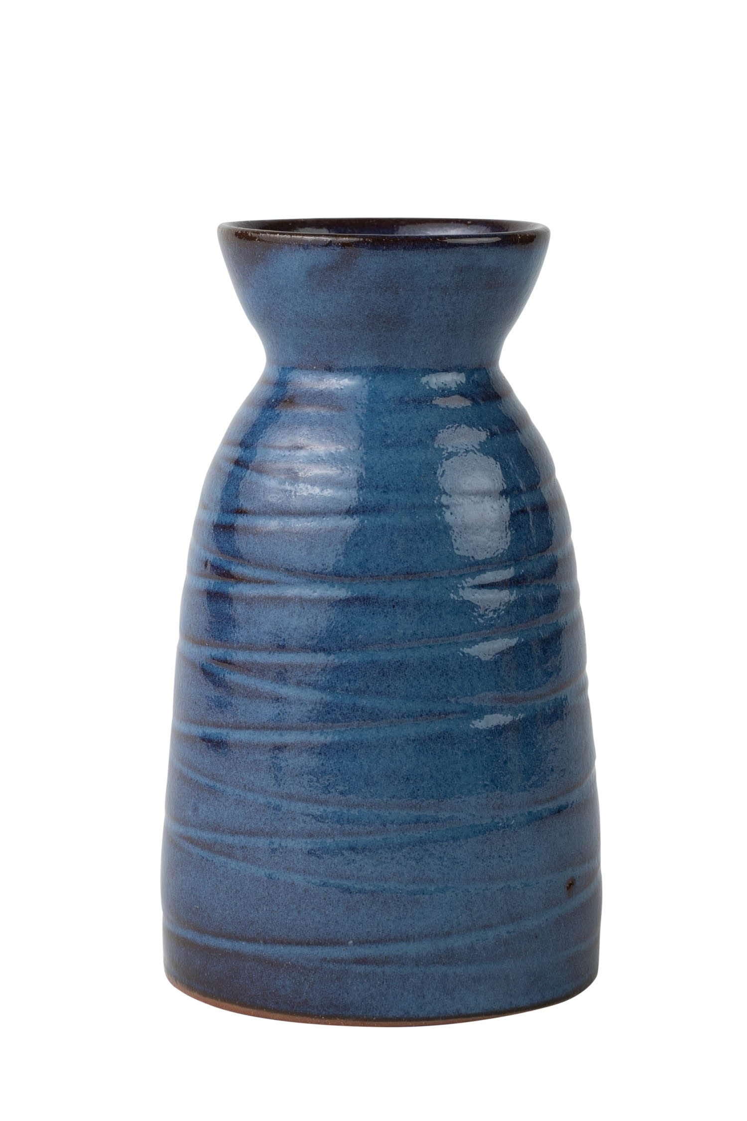 Elegant handmade sake carafe showcasing its unique design and craftsmanship.