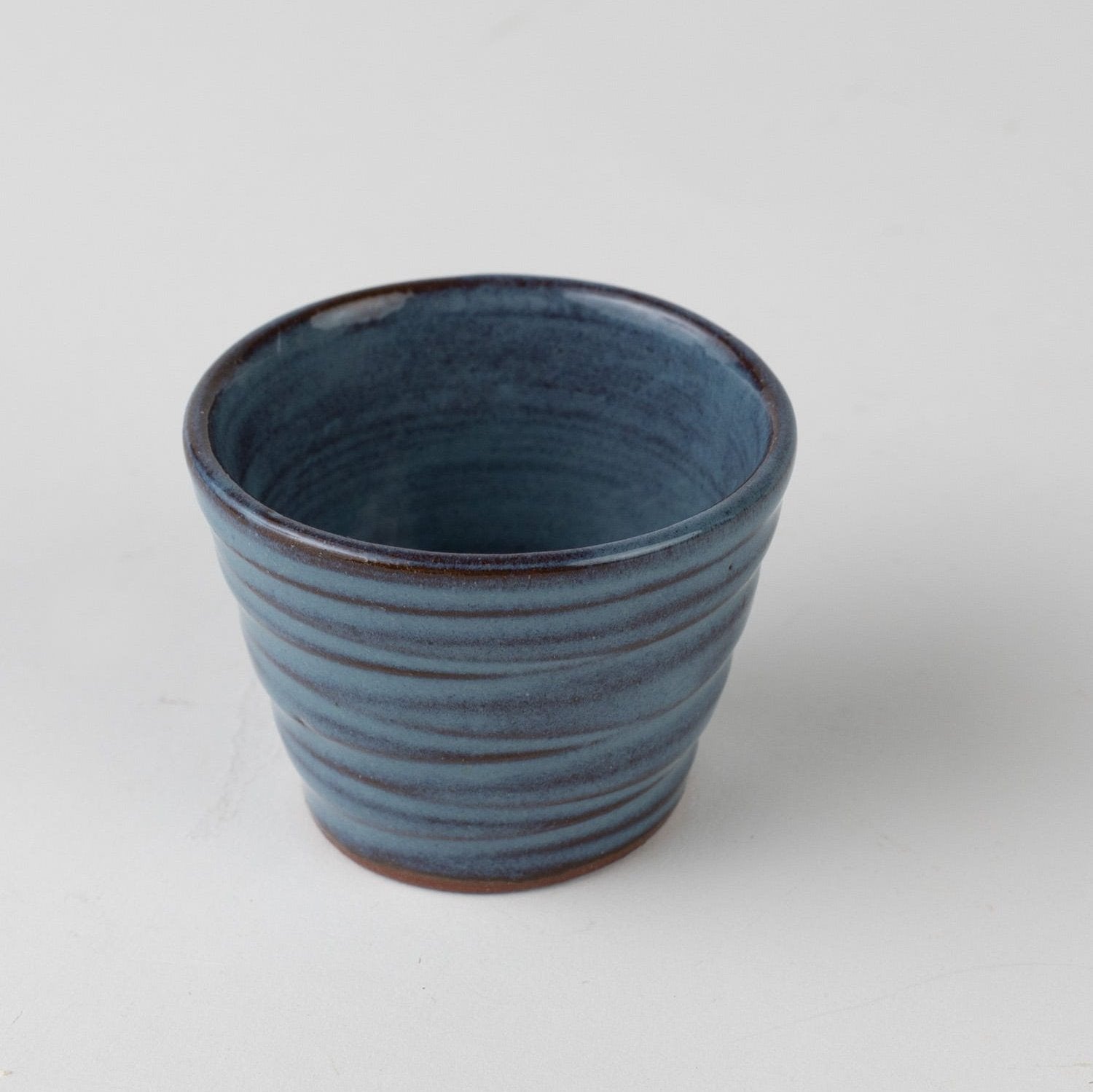 Elegant handmade ceramic sake cup with traditional design, ideal for gift giving
