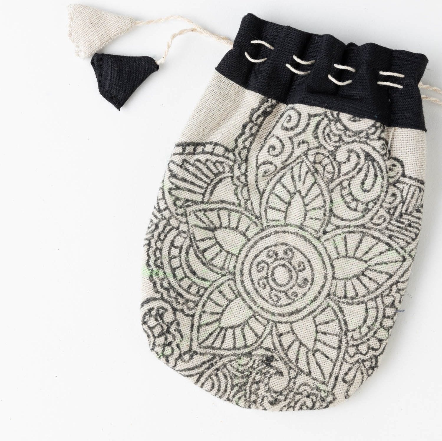 Artisan gift bag showcasing unique prints, ideal for jewelry storage.