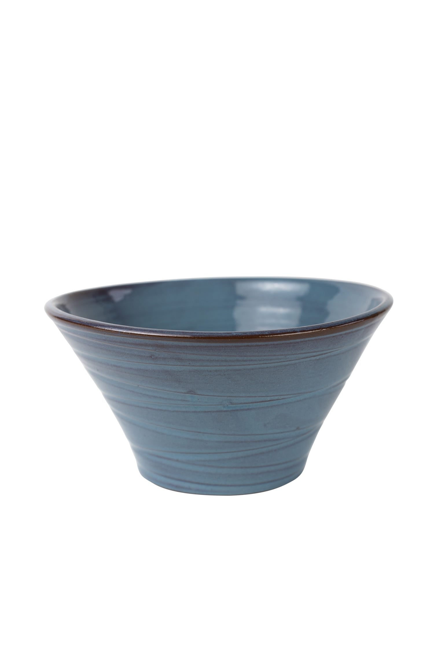 Close-up of textured exterior of handmade ceramic salad bowl