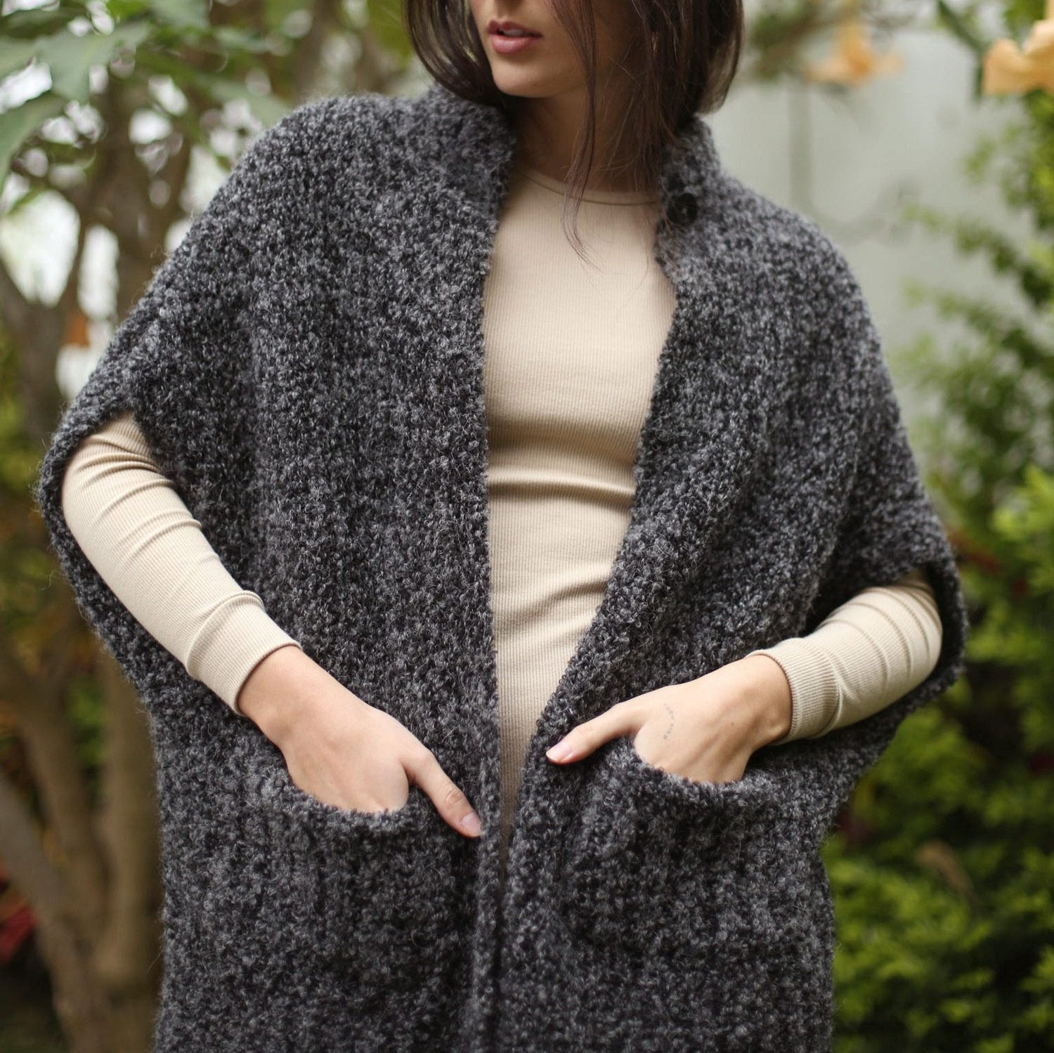 Front view of the luxury oversized boucle cardigan with pockets, showcasing its elegant design.