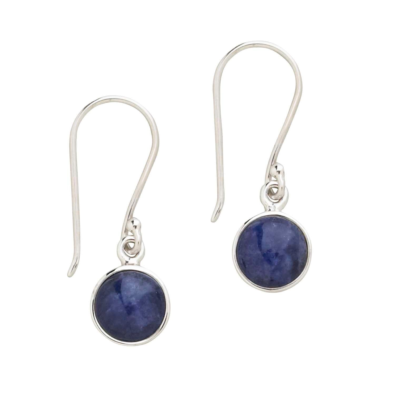 Close-up of handcrafted sterling silver blue earrings featuring sodalite gemstones