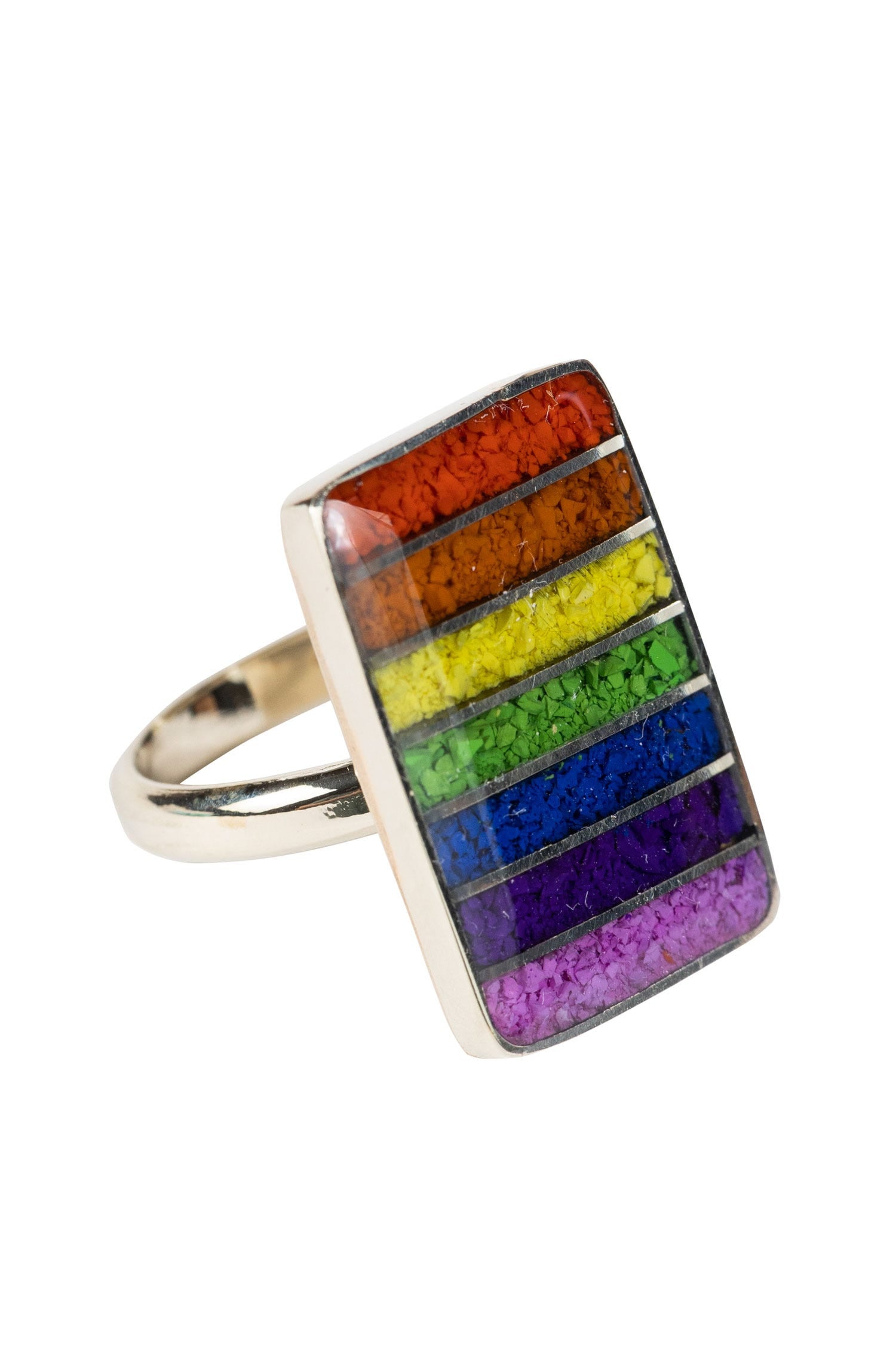 Close-up of the vibrant rainbow cuff ring highlighting its colorful resin design.