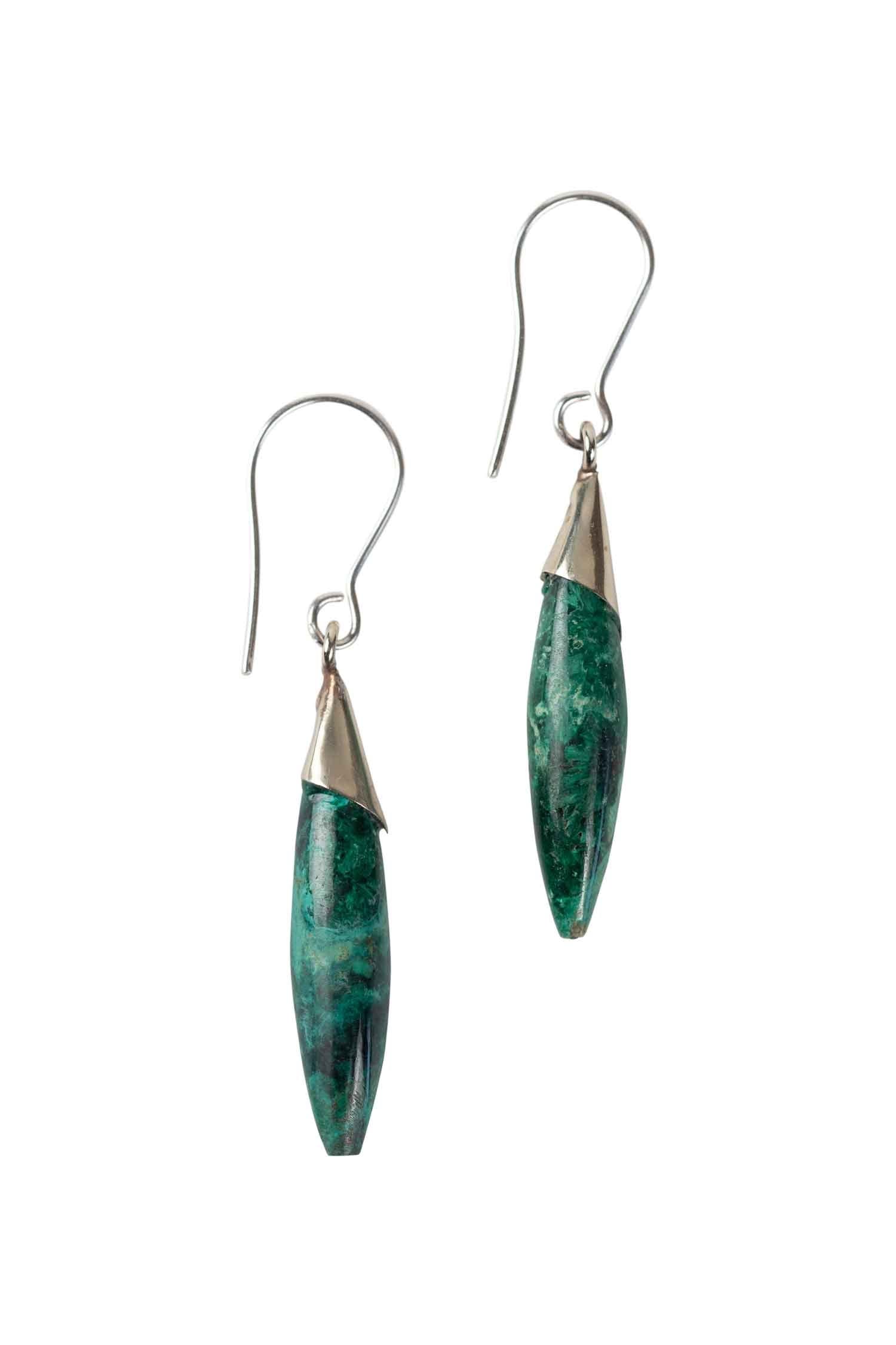 Handcrafted turquoise oval earrings showcasing vibrant color and elegant design.