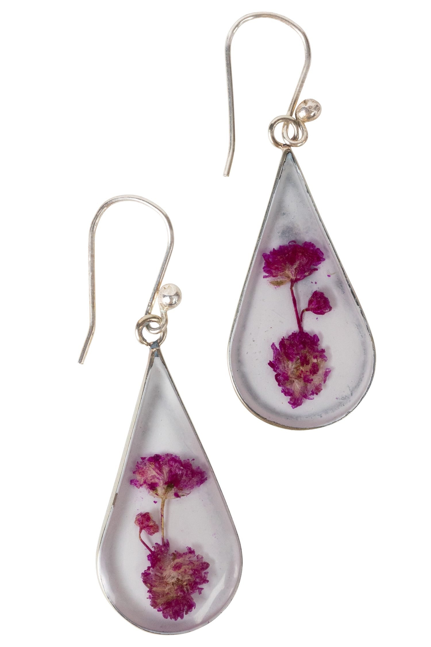 Close-up of purple rain flower earrings showing intricate resin and dried flower details