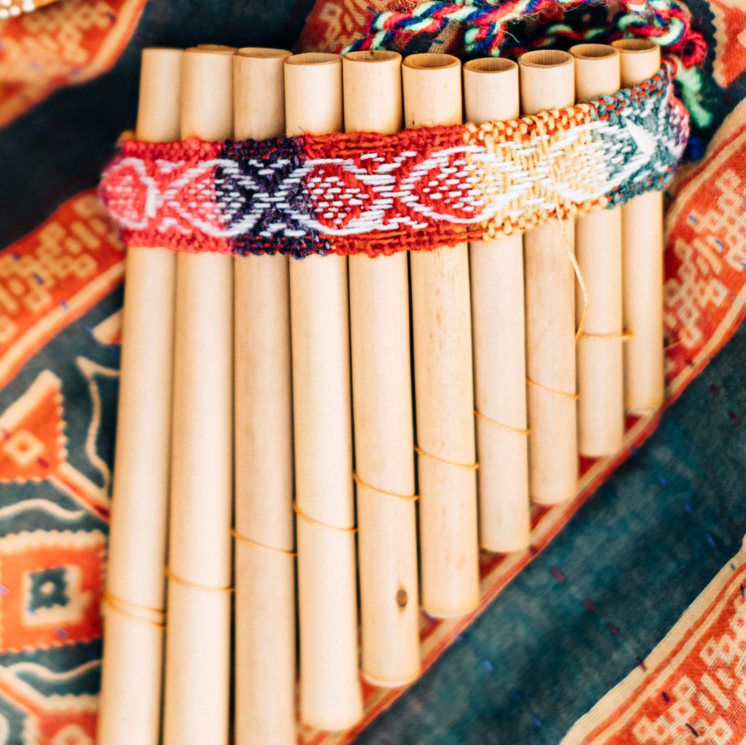Close-up of handcrafted Andean panpipes, highlighting the intricate details and craftsmanship.