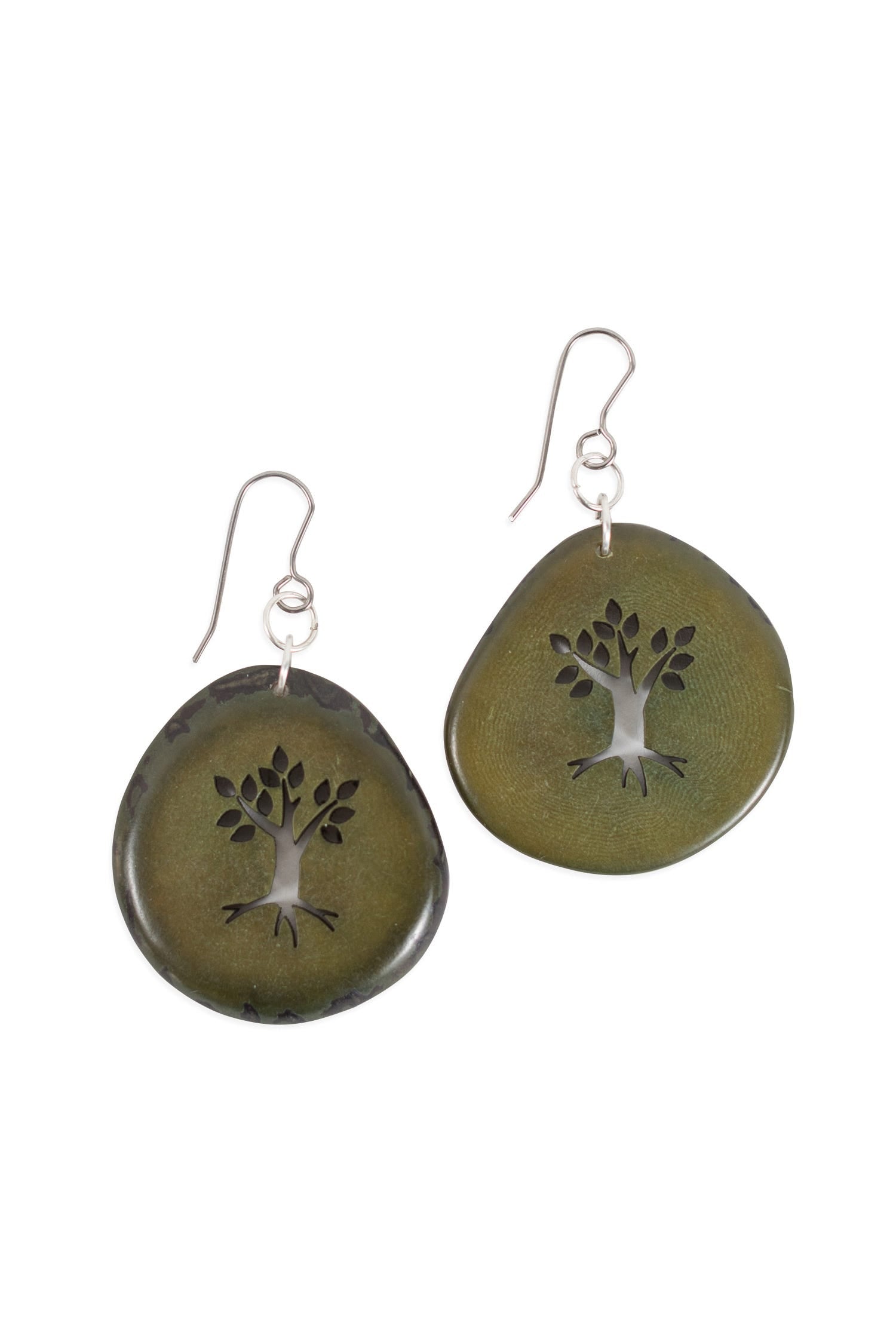 Close-up of eco-friendly tree earrings featuring tagua nuts, showcasing their natural texture.