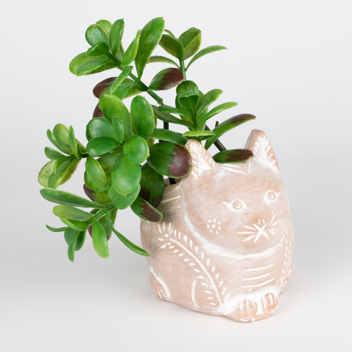 Charming Crouching Cat Ceramic Planter from a side angle, displaying its intricate design and terracotta texture.