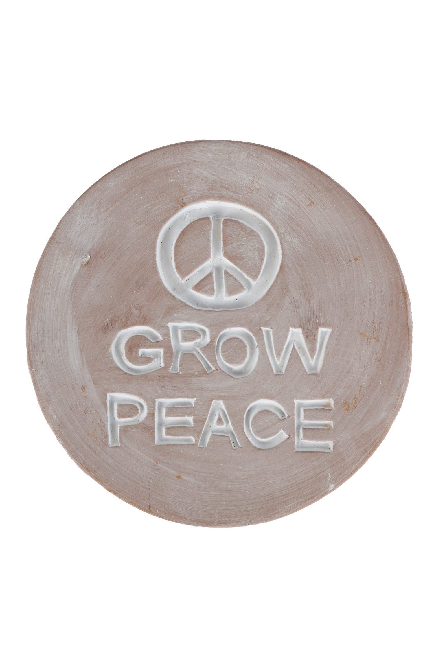 Close-up of the Grow Peace Garden Plaque displayed on an outdoor garden wall, showcasing the intricate artisan craftsmanship.