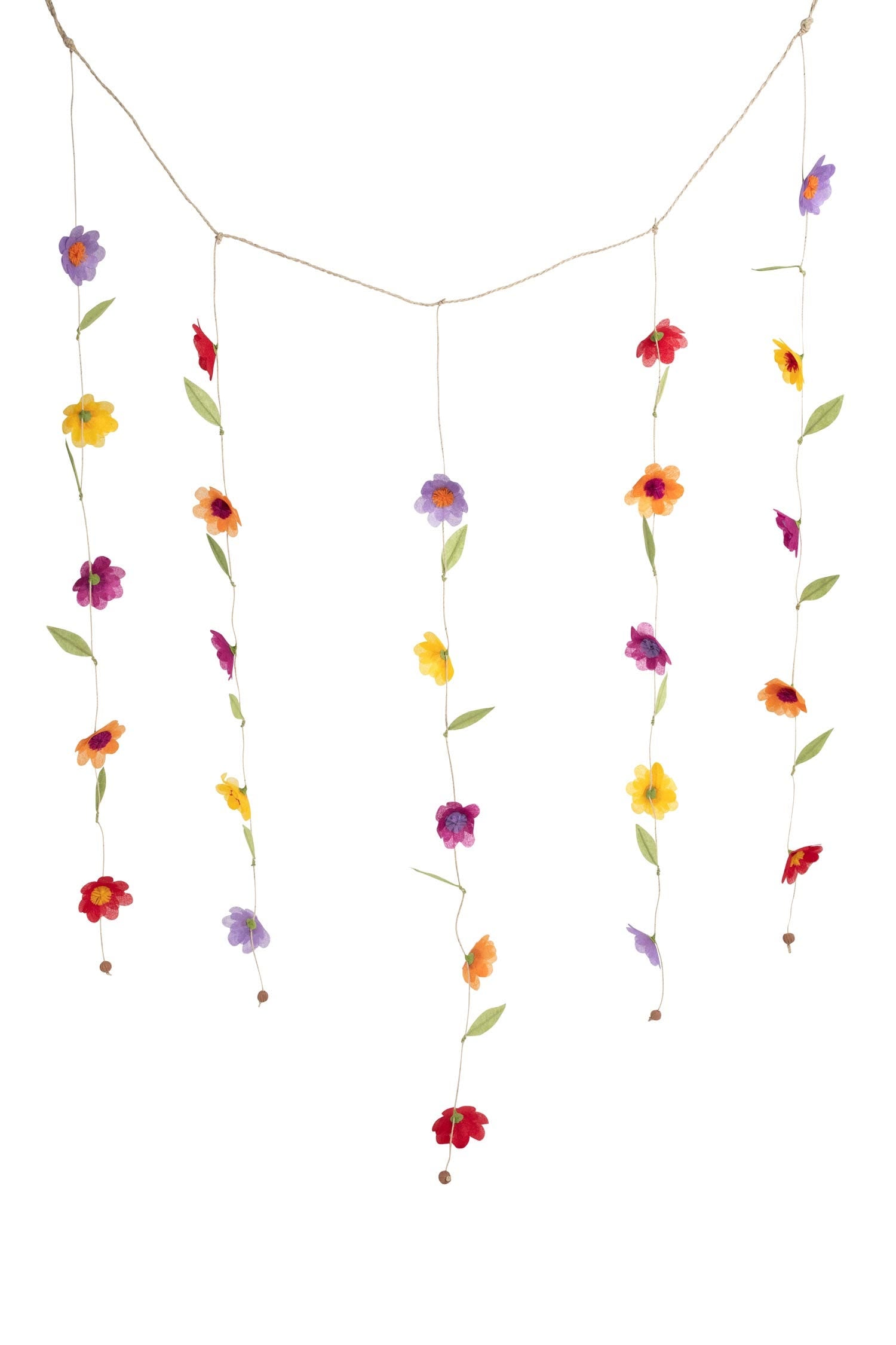 Colorful silk paper flower valance draped across porch railing for vibrant home decor