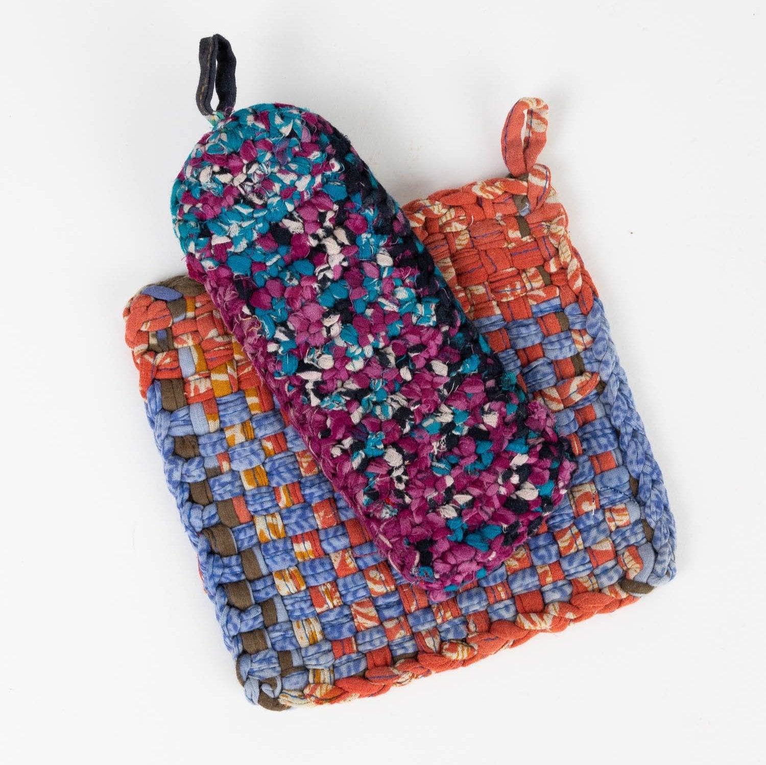 Colorful artisan sari skillet set on a kitchen countertop, showcasing its unique design.