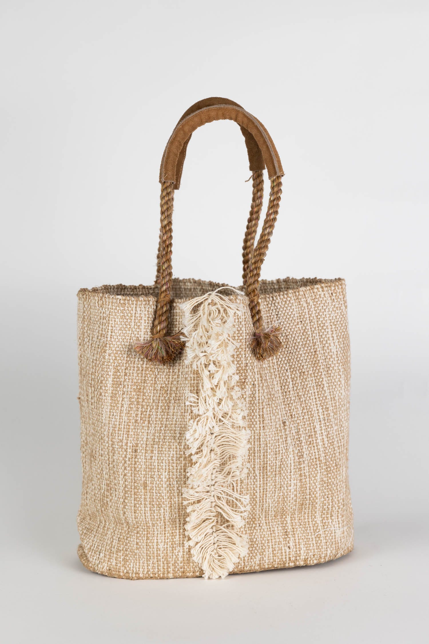 Eco-friendly luxury tote with leather handles, perfect for beach outings.