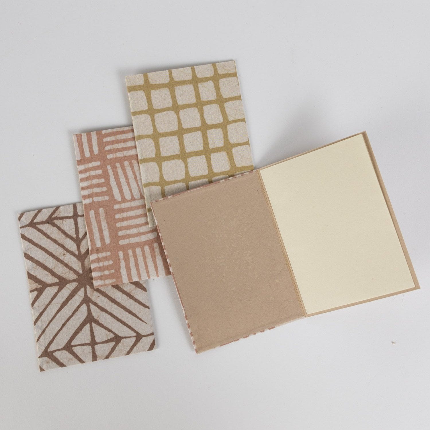 Close-up of handcrafted batik fabric greeting card with intricate dye patterns