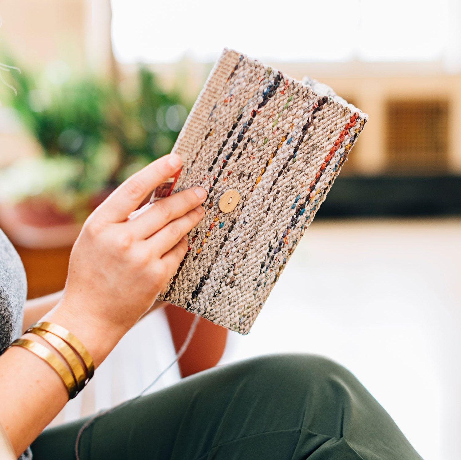EcoWise Recycled Notebook showing recycled paper texture and cover design.