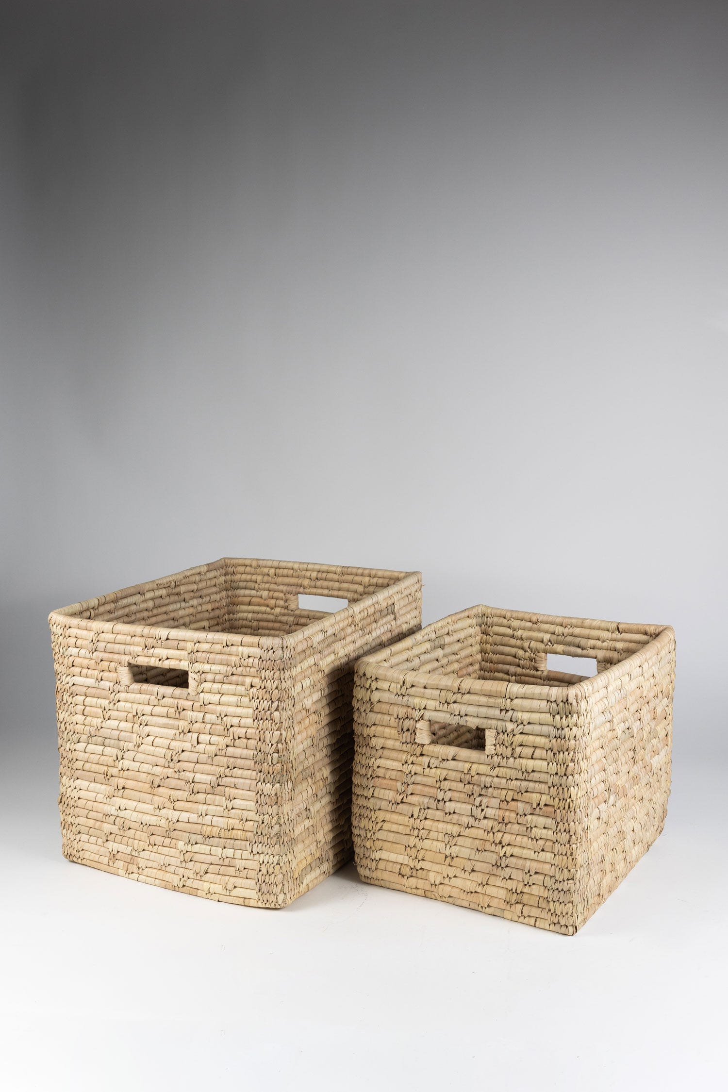 Close-up of handwoven rattan storage basket showing detailed craftsmanship