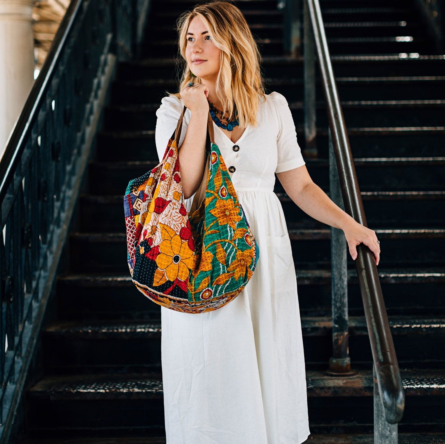 Vibrant patchwork recycled sari fabric tote with slouchy design, perfect for casual outings