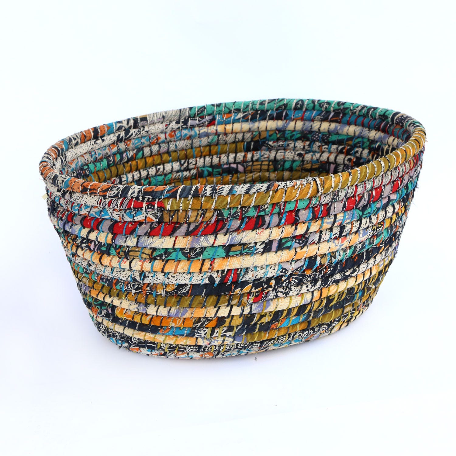 Colorful handwoven sari laundry basket for eco-friendly storage in living room