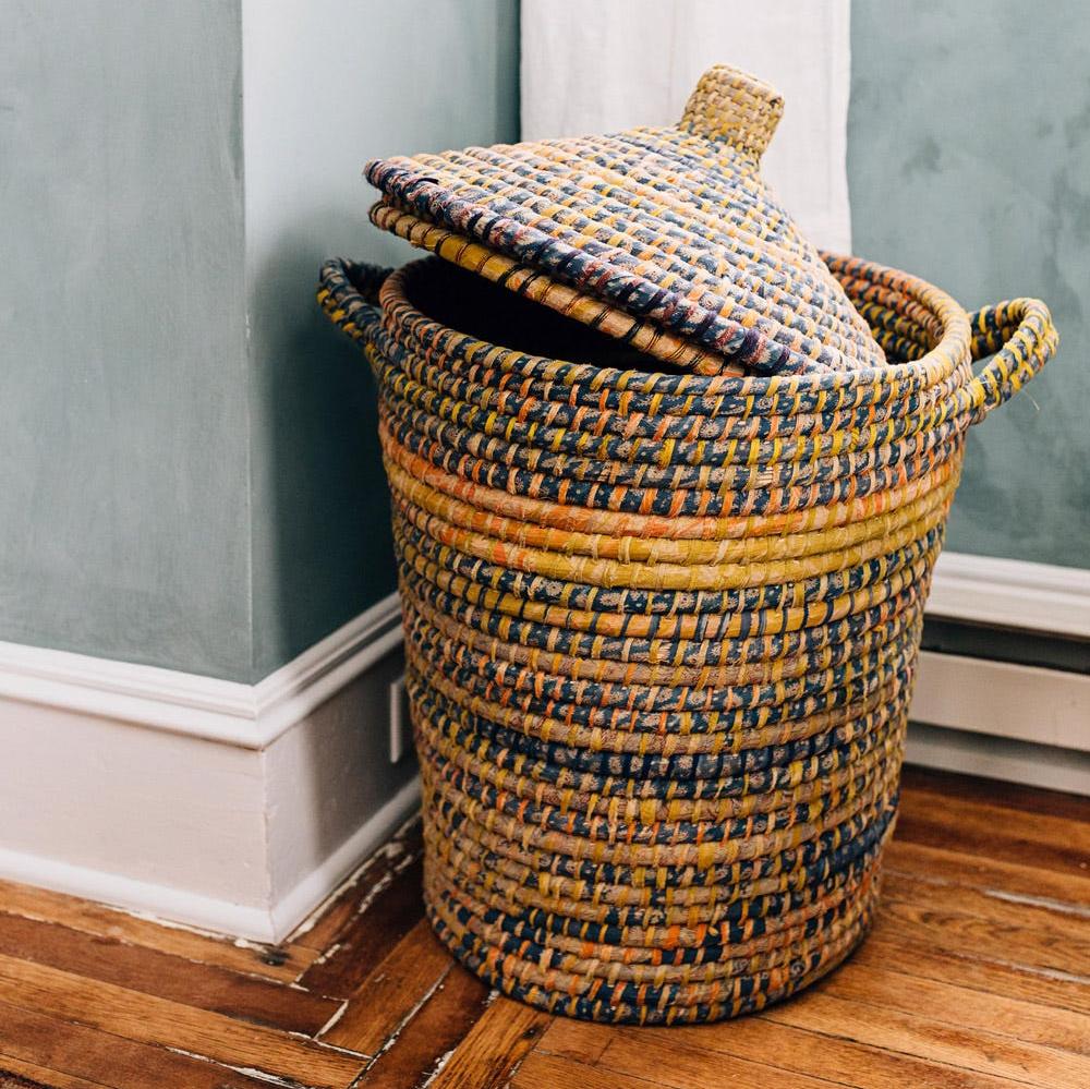 Close-up of handwoven basket showing intricate weaving from Kaisa grass