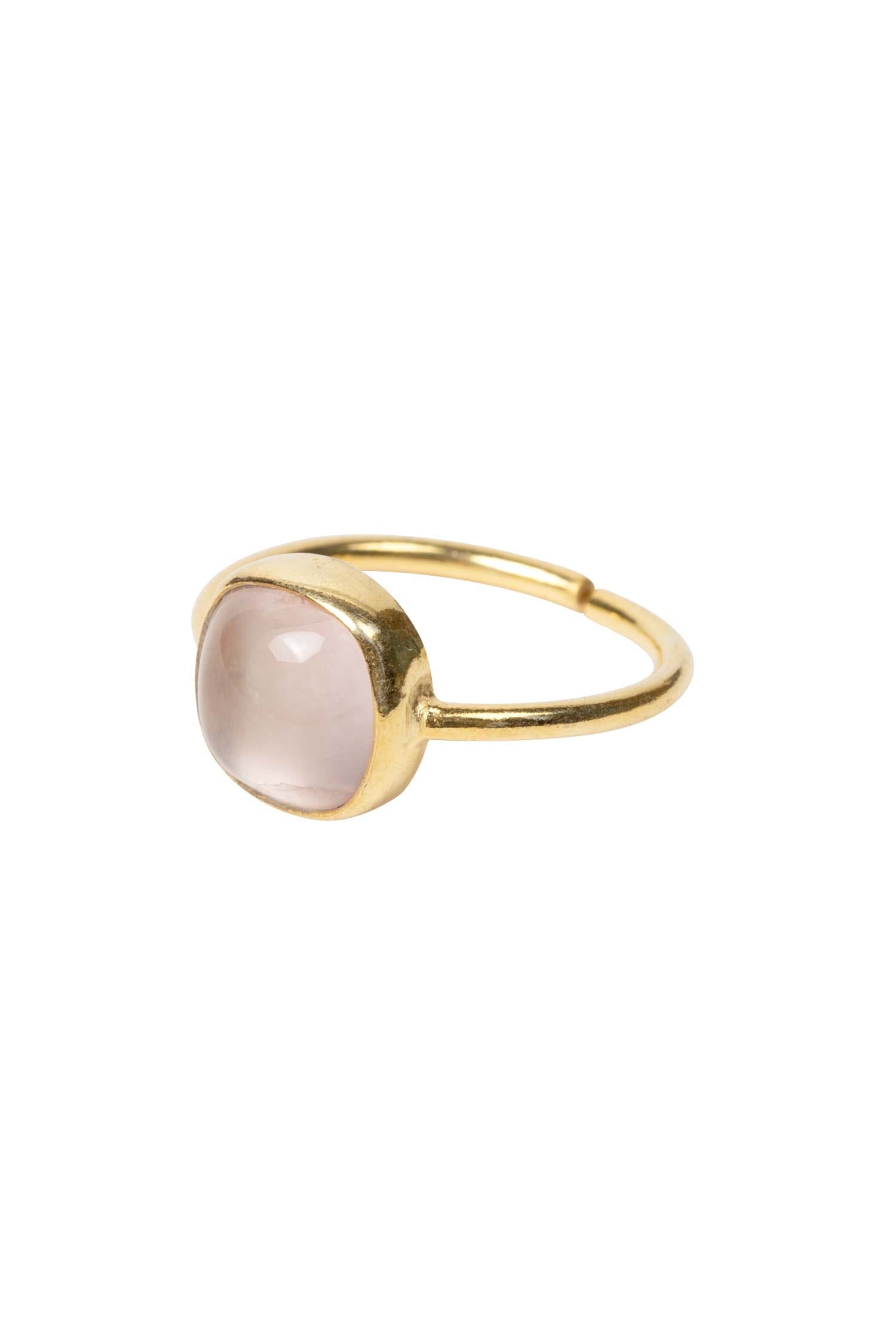Handcrafted rose quartz ring with artisan detailing, ideal for women’s boho jewelry collection