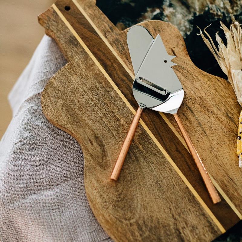 Close-up of the Musical Harmony Wooden Serving Board showcasing its fine craftsmanship and wood grain.