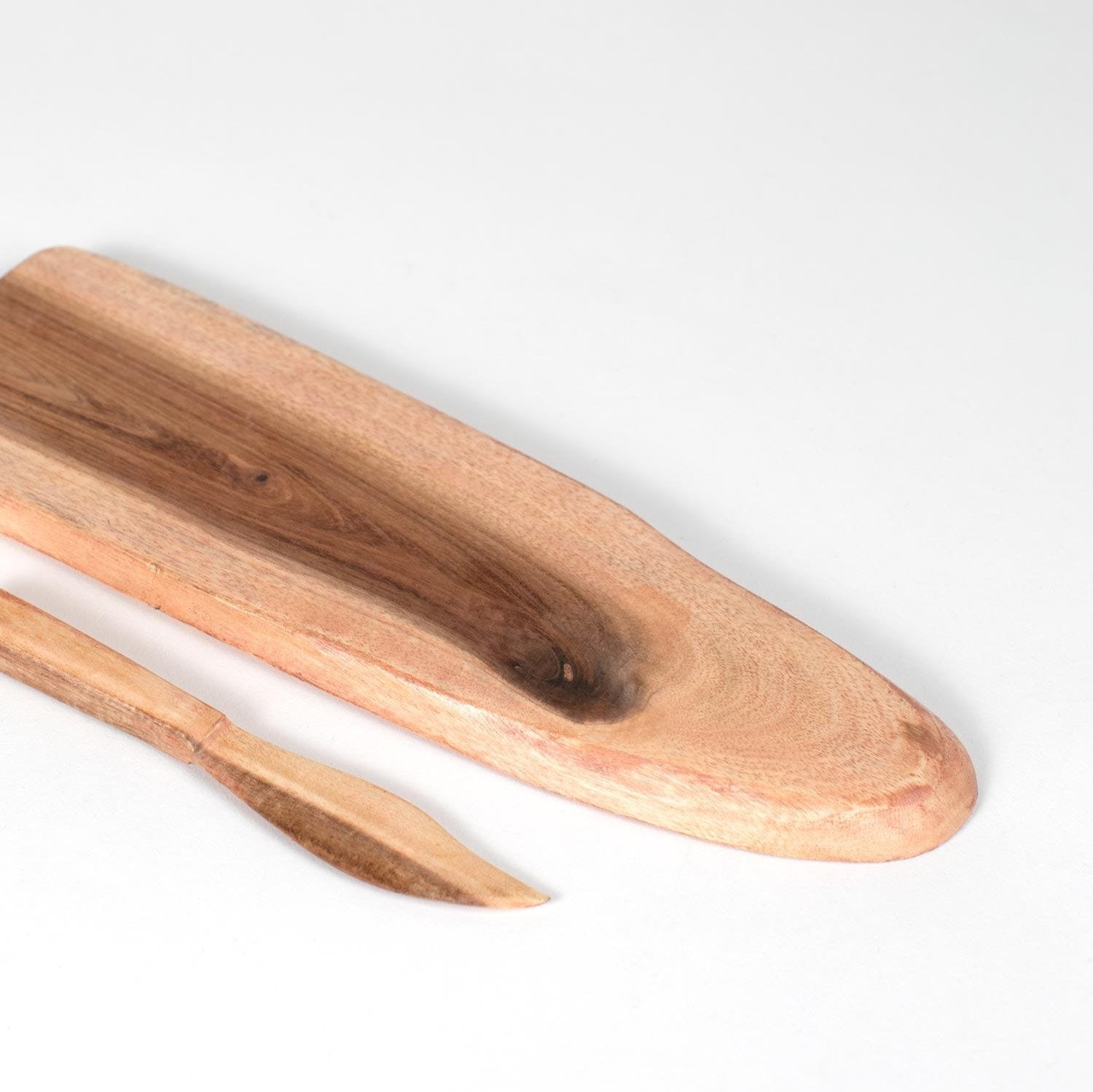 Elegant artisan cheese and charcuterie platter set on a rustic table.