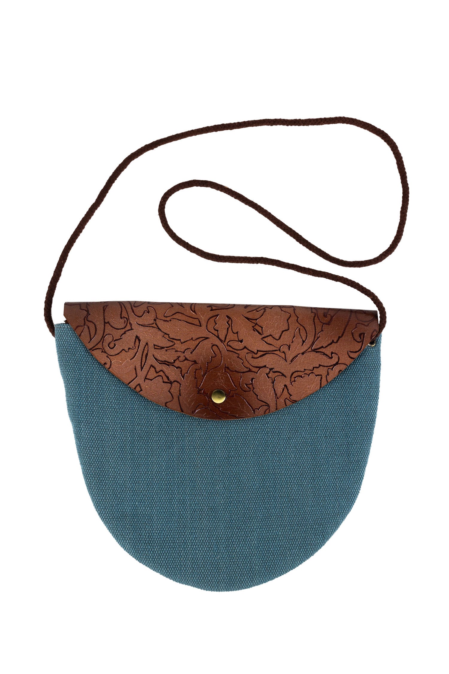 Side view of Shanti leather and canvas purse showing adjustable strap