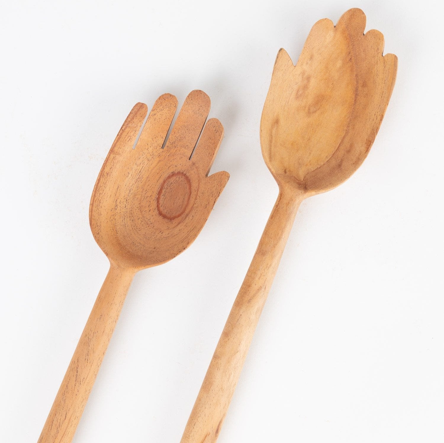 Neem wood salad servers with prongs, perfect for serving salads at a dinner party.