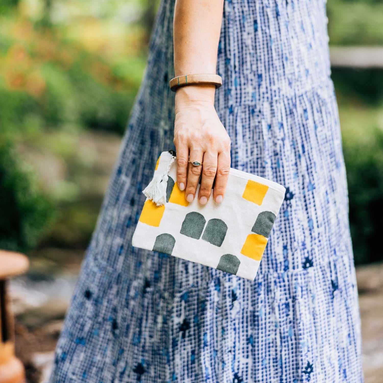 Village Windows Tote Organizers showcasing the yellow and gray block print, ideal for organizing travel essentials.