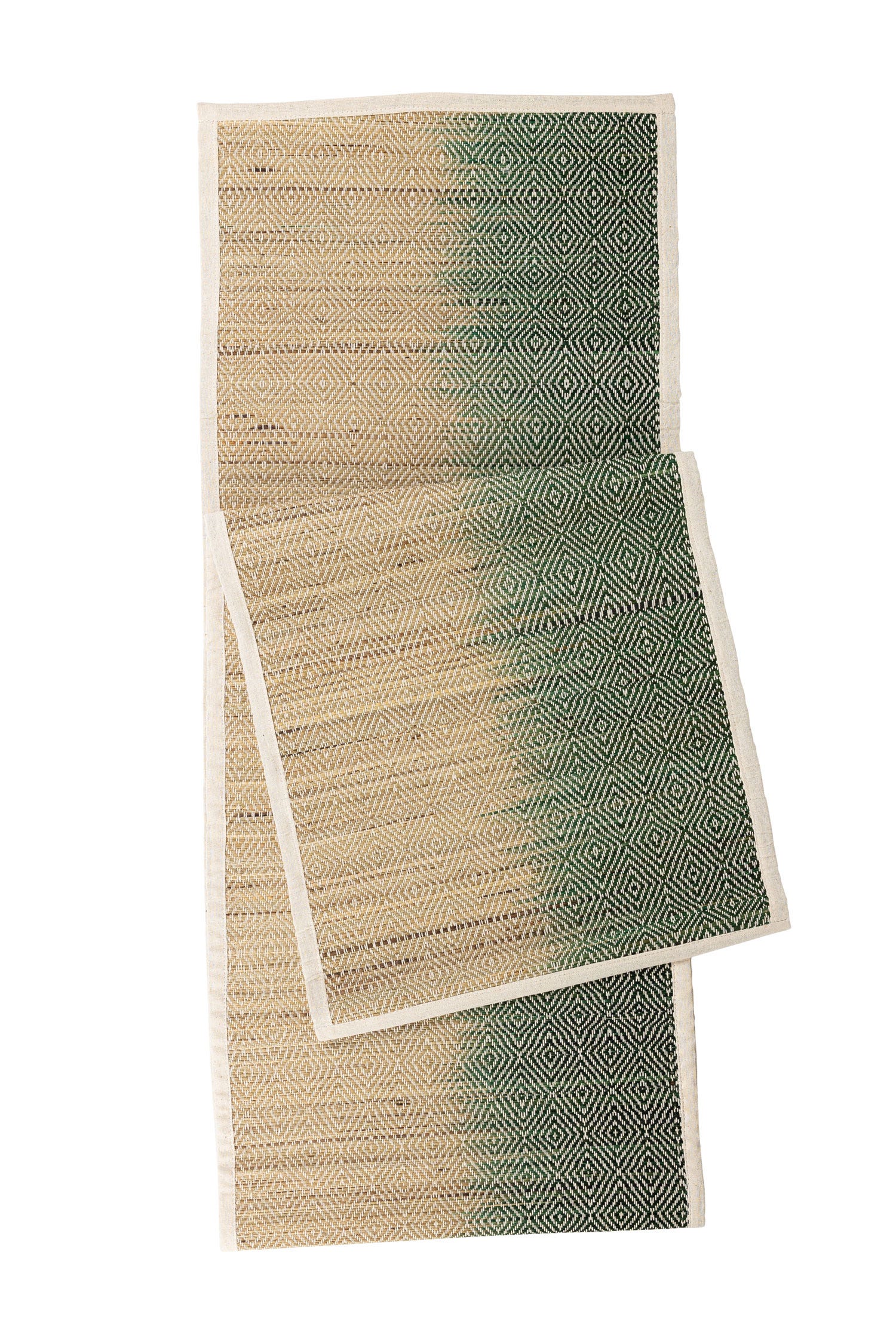 Elegant Woven Grass Table Runner displayed on a dining table with floral decor.