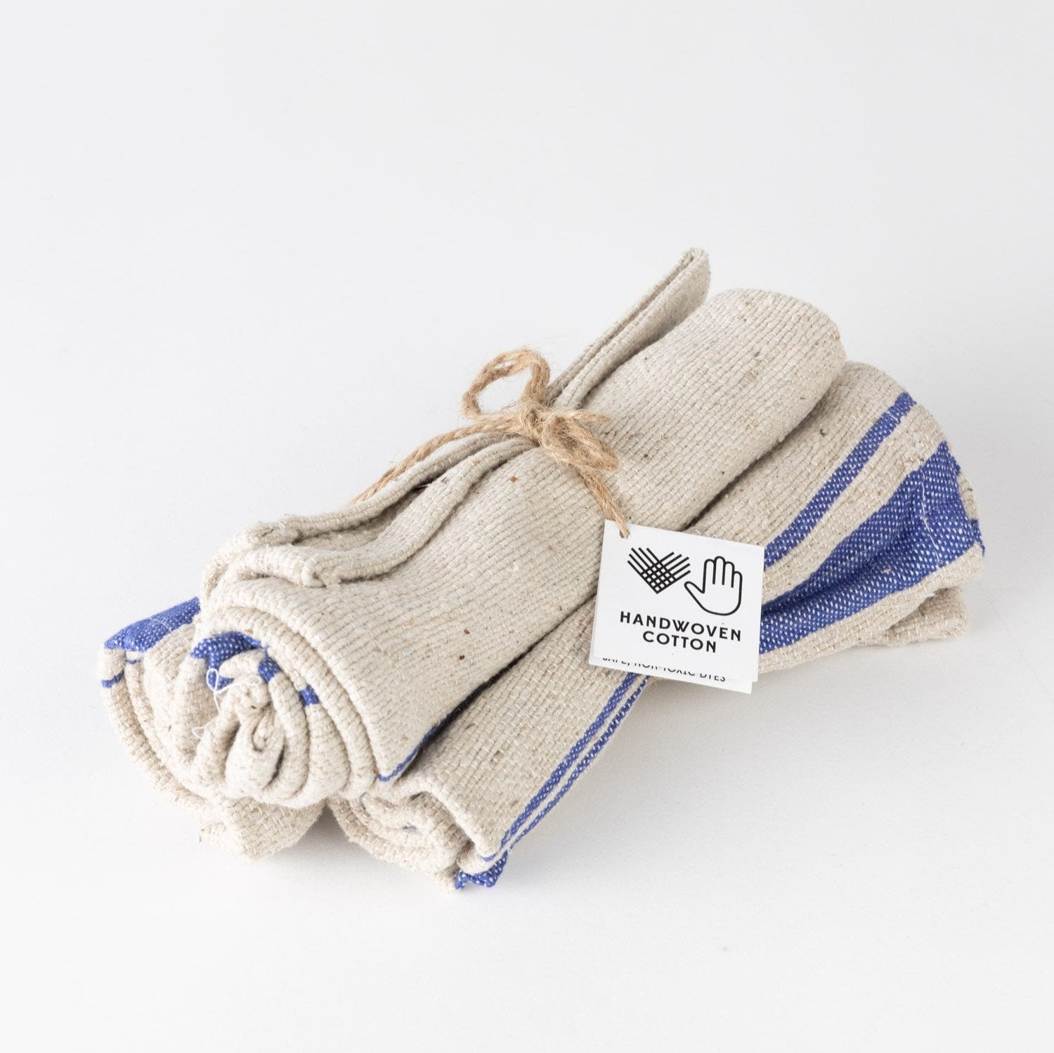 Close-up of artisan handwoven blue tan dish cloths showcasing their texture and absorbency.