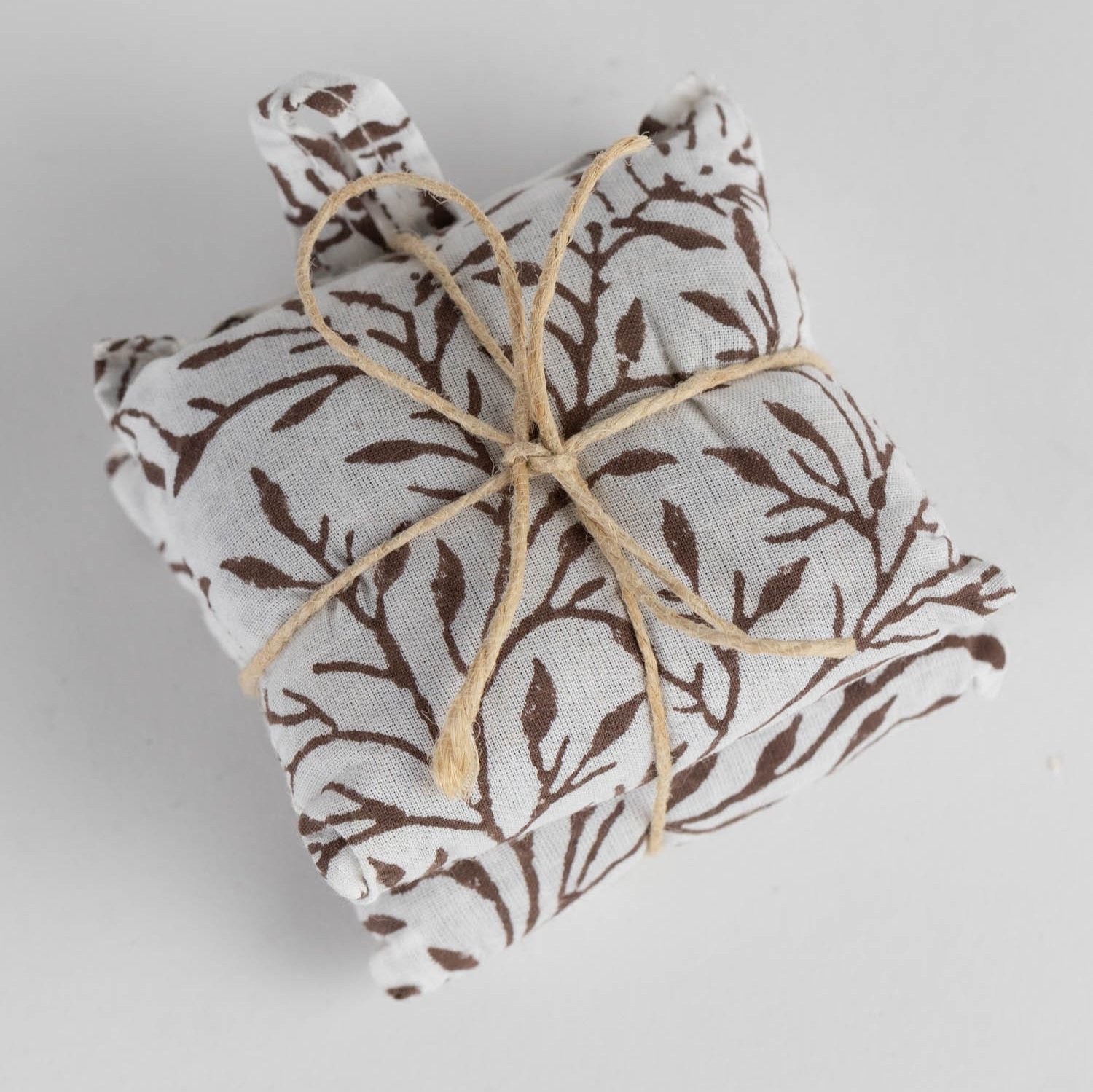 Serenity lavender sachet set beautifully displayed in a cozy bedroom.