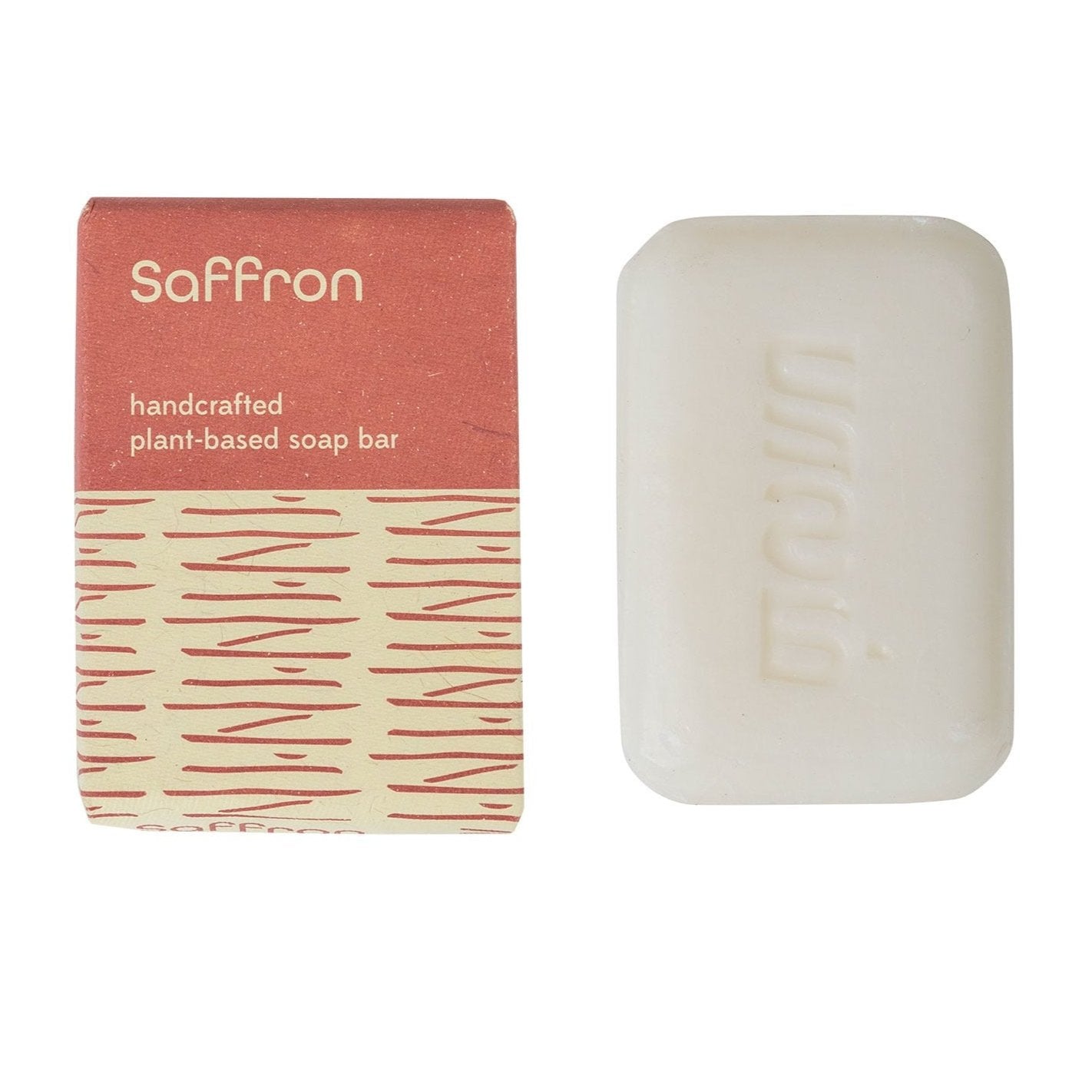 Golden Glow Saffron Soap showcasing its smooth texture and rich color.